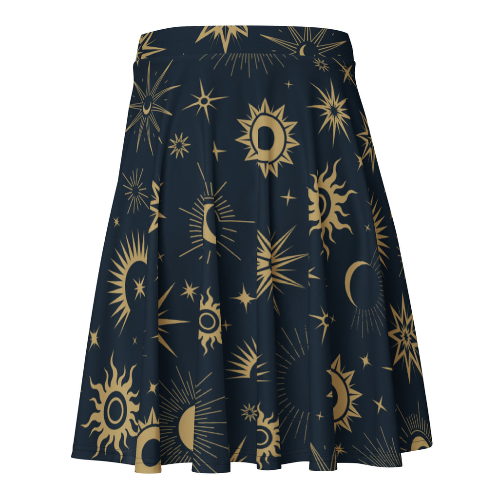 A navy blue pleated women’s celestial sun and moon skater skirt with vibrant gold pattern made from recycled fabric