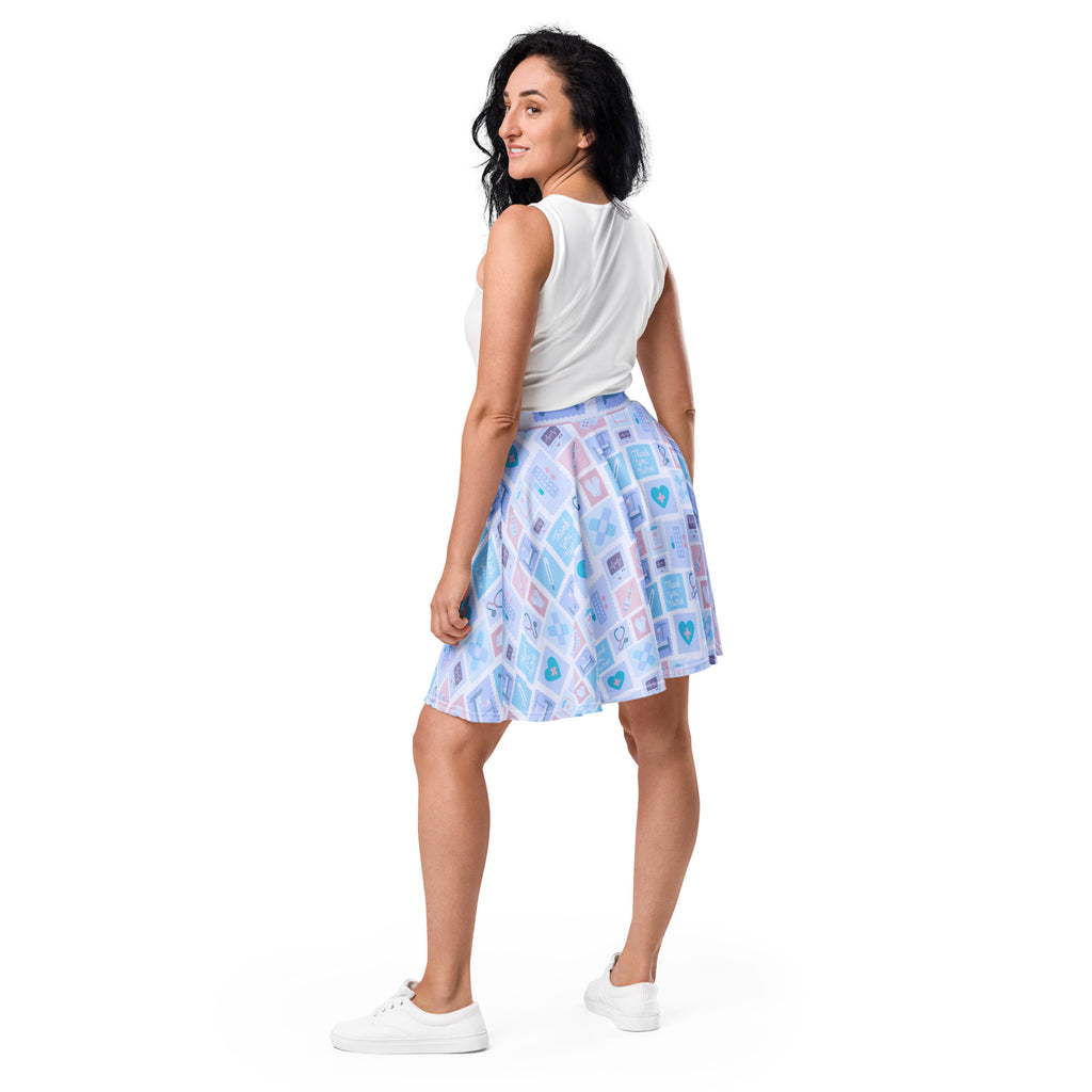 Women’s blue nurse icon skater skirt with light blue and pink heart pattern flowy high waisted recycled fabric upf 50+