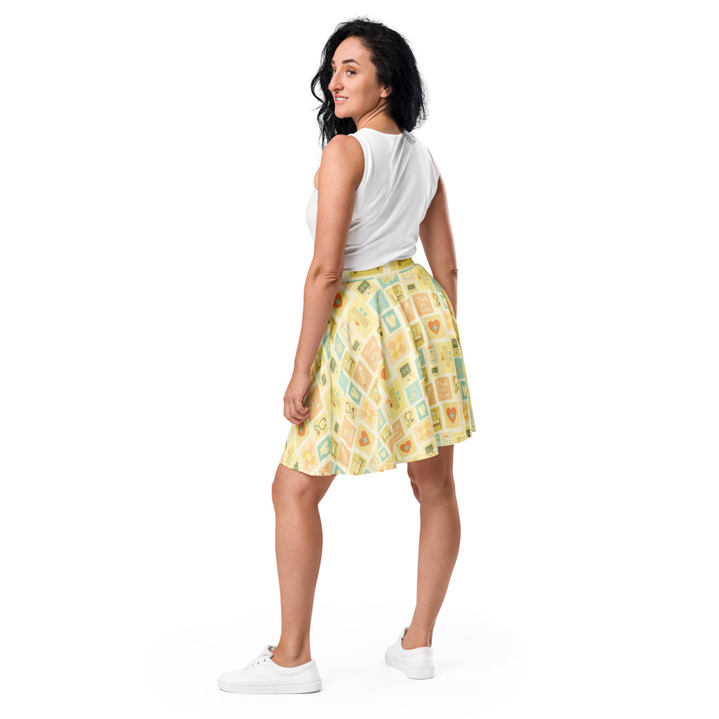 Women’s yellow nurse icon skater skirt with pleats pastel squares and hearts flowy high waisted upf 50 recycled fabric