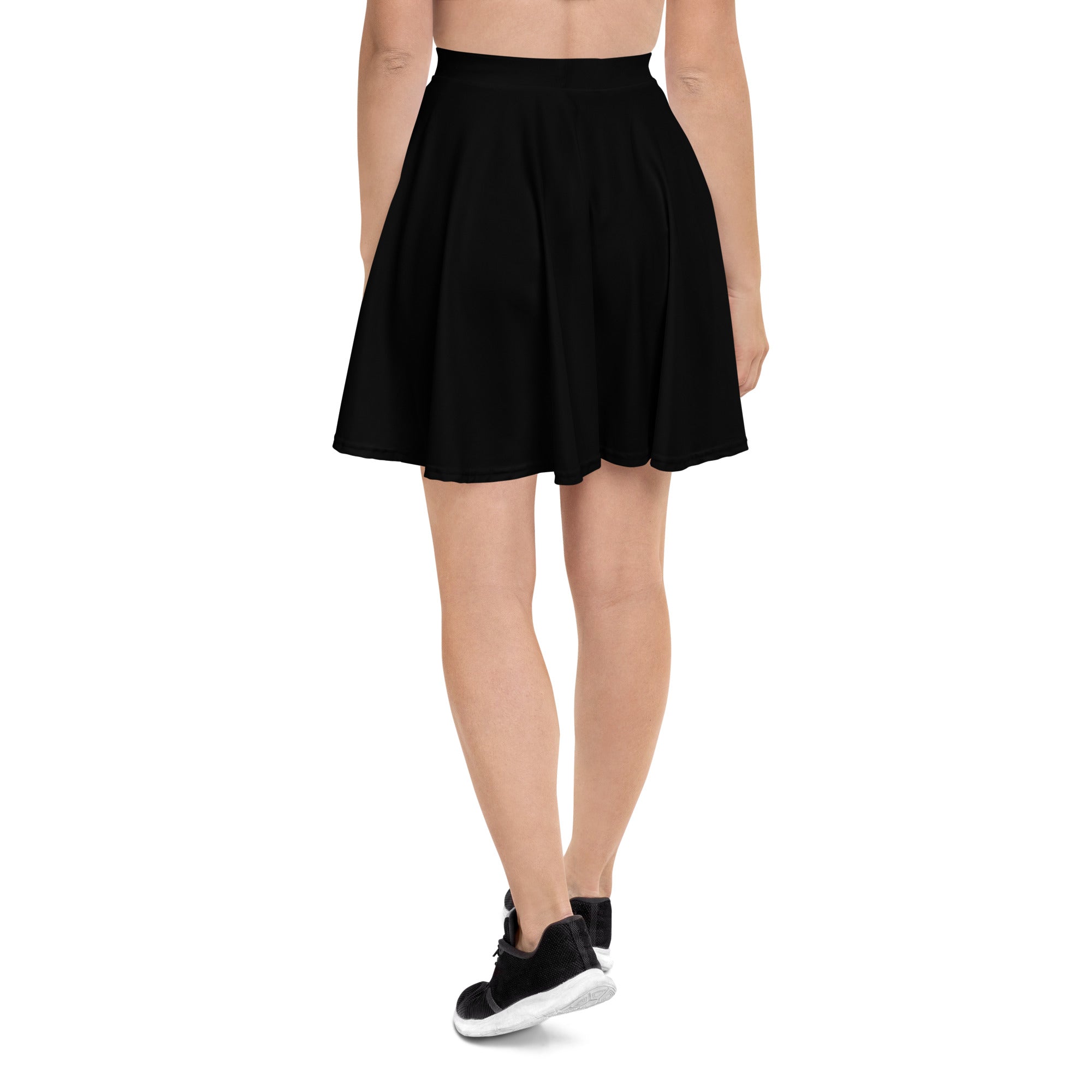 Women’s black high waisted pleated skirt made from recycled fabric with upf 50 plus protection