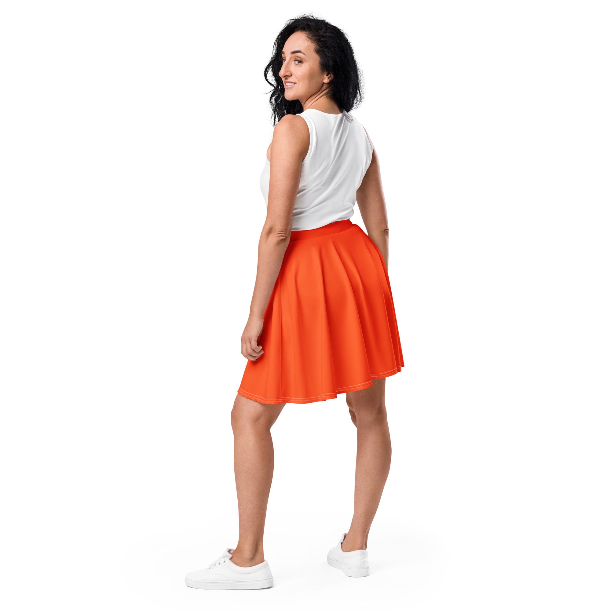 Bright orange pleated women’s skater skirt high waisted flowy with recycled fabric and UPF 50 plus protection