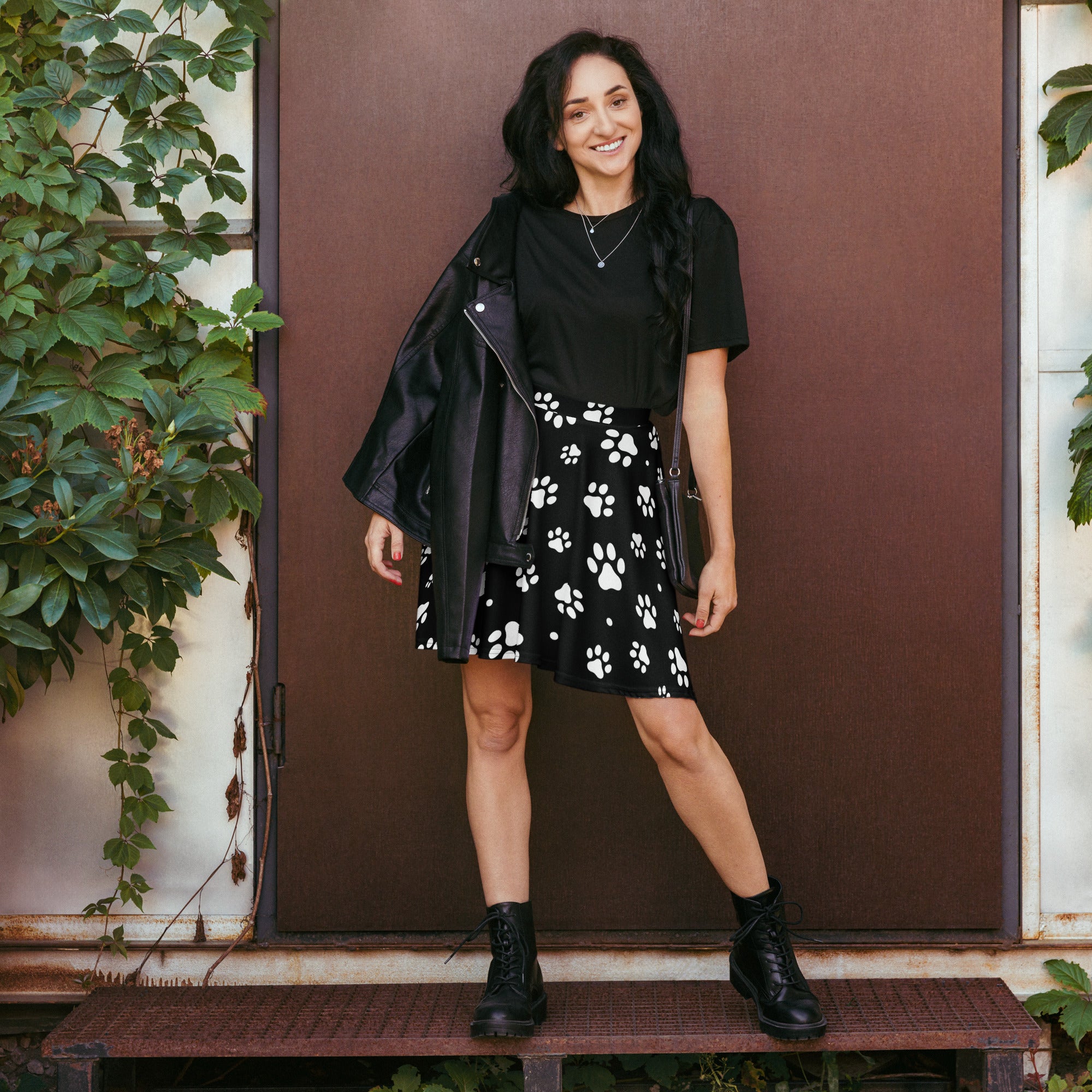 Women’s black skater skirt with white paw print pattern flowy high waisted upf 50 plus recycled fabric