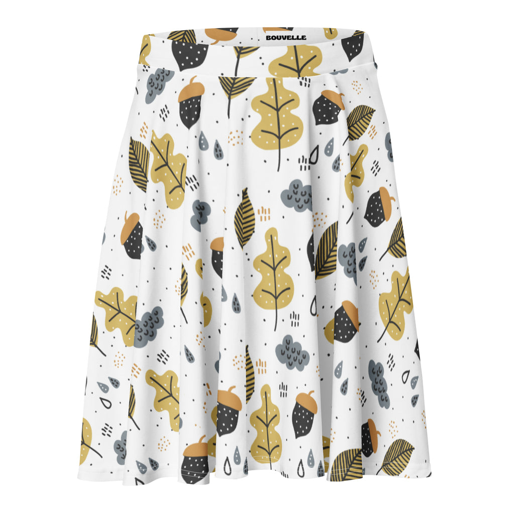 Women’s white a-line skater skirt with autumn-themed yellow black gray leaves acorns raindrops flowy high waisted upf 50 recycle fabric