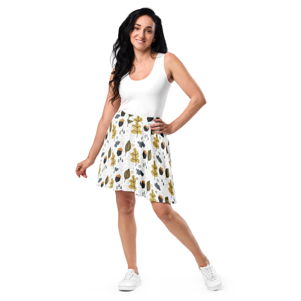 White a-line skirt with gold black and brown leaf pattern high waisted skater skirt with upf 50 plus recycled fabric