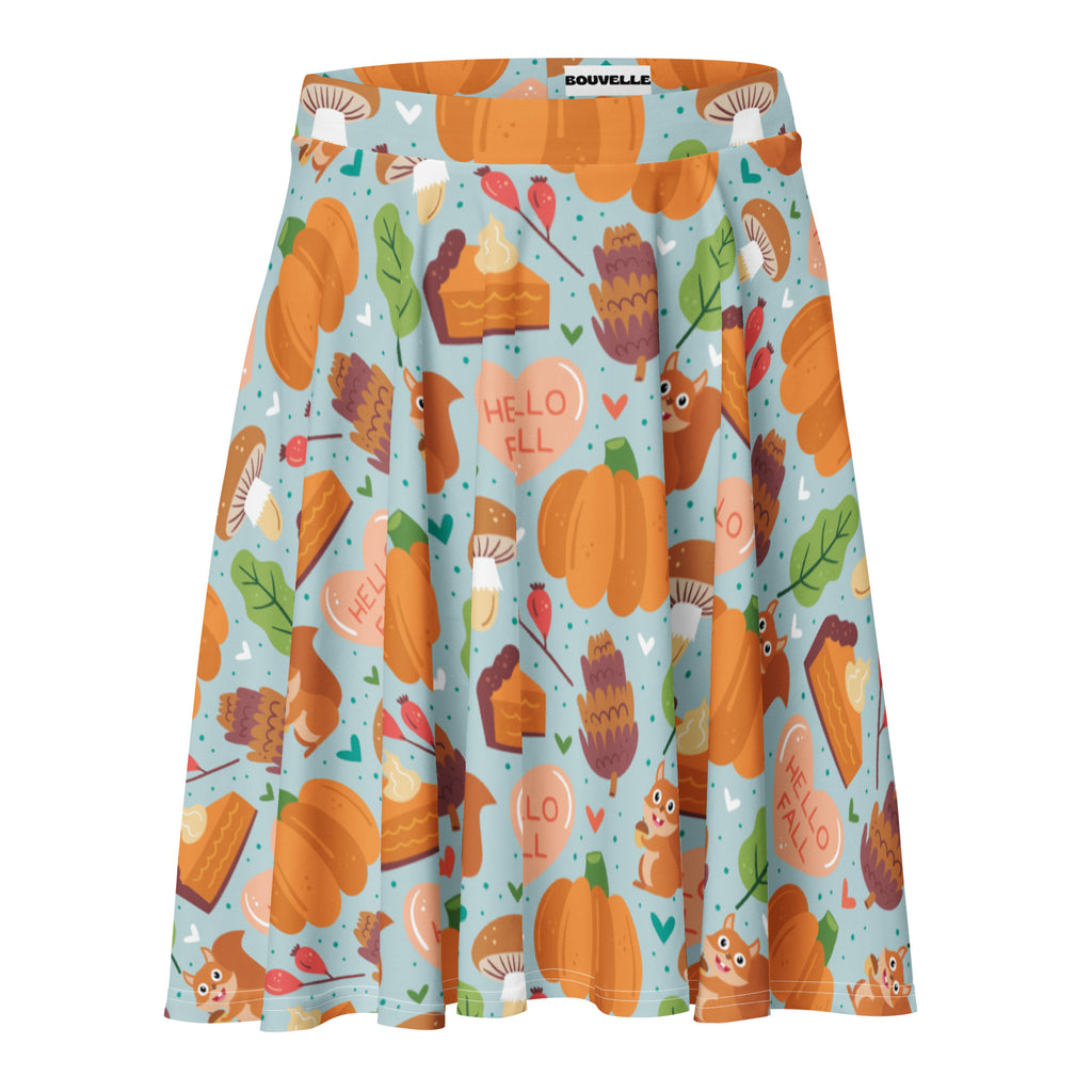 Women’s hello fall light blue pleated skater skirt with autumn pumpkin squirrel print made from recycled fabric with upf 50+