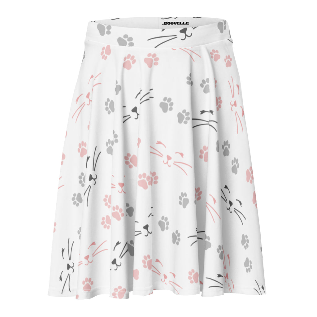 White pleated skater skirt with pink and gray cat faces and paw prints made from recycled fabric with upf 50+ protection
