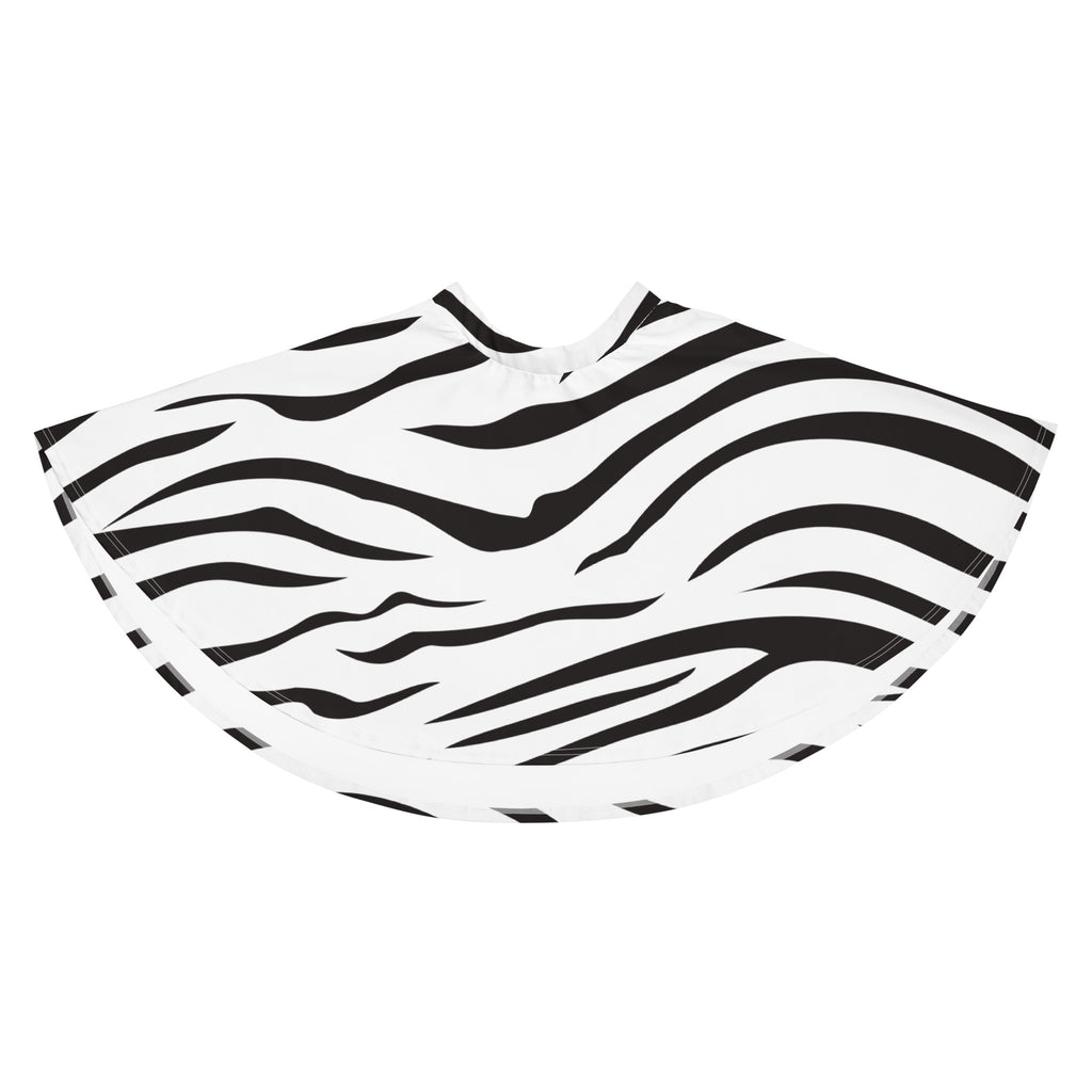 A black and white zebra-striped plastic hair cape featuring a flowy high waisted design with upf 50 and recycled fabric