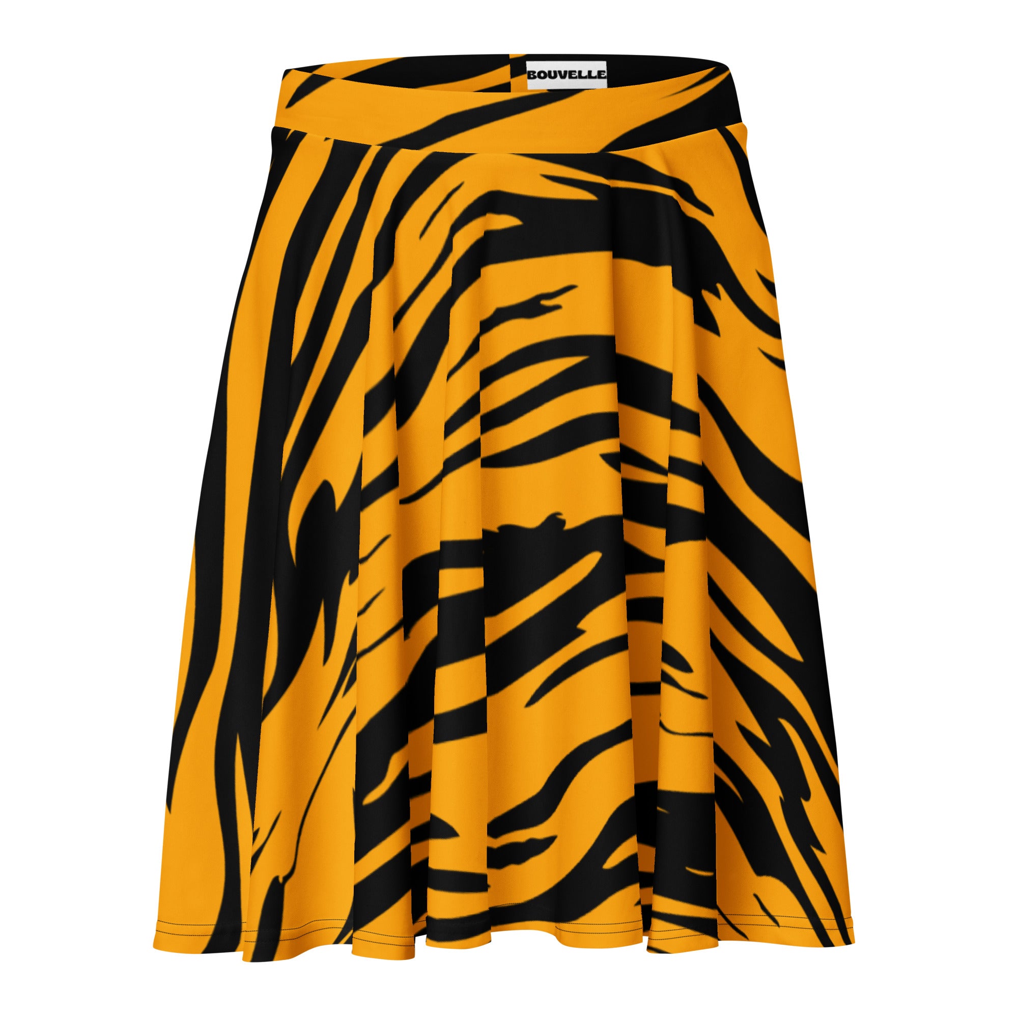A vibrant yellow and black tiger print pleated skater skirt by Souvelle made with recycled fabric and UPF 50+ protection