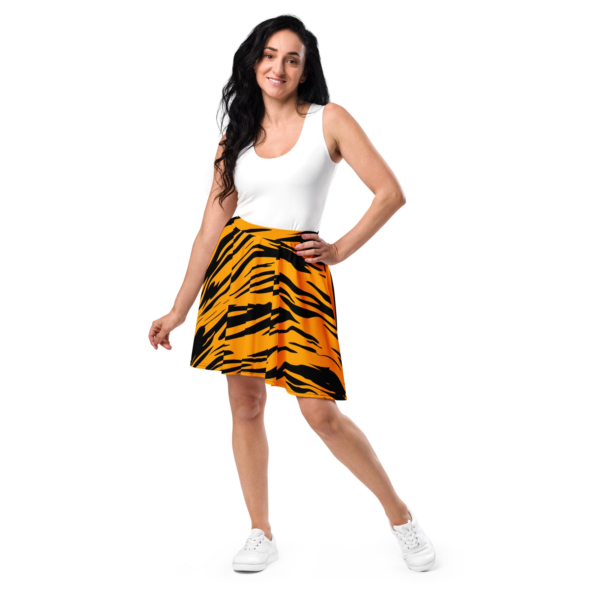 A vibrant orange and black tiger print skater skirt with flowy high waist made from recycled fabric and upf 50 plus protection