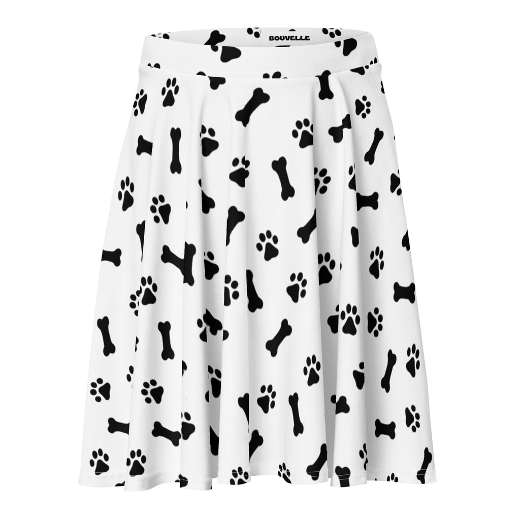 White pleated women’s skater skirt with black paw print and bone pattern high waisted flowy recycled fabric upf 50+