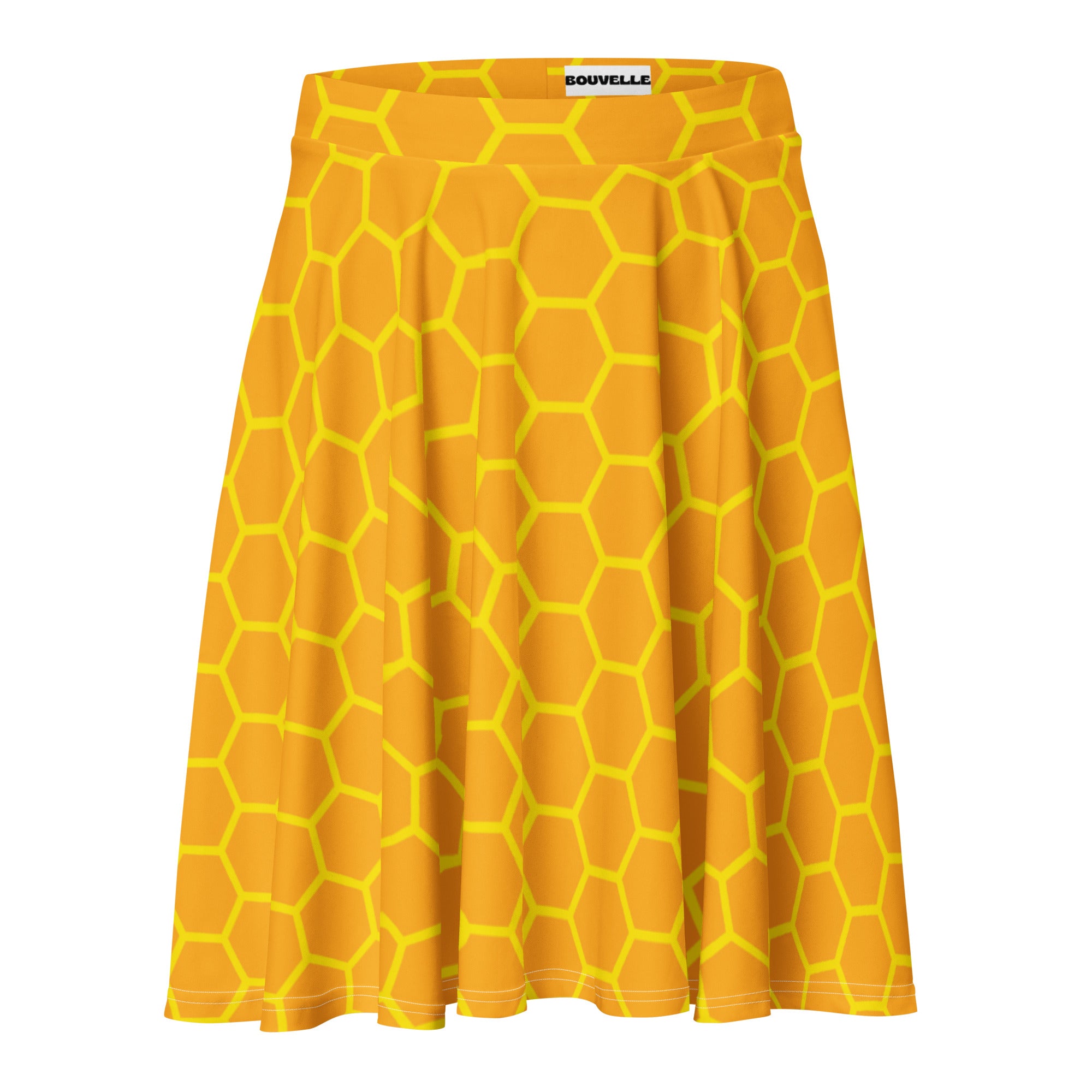 A vibrant yellow women’s honeycomb skater skirt with pleats high waisted UPF 50 plus made from recycled fabric by Bouvelle