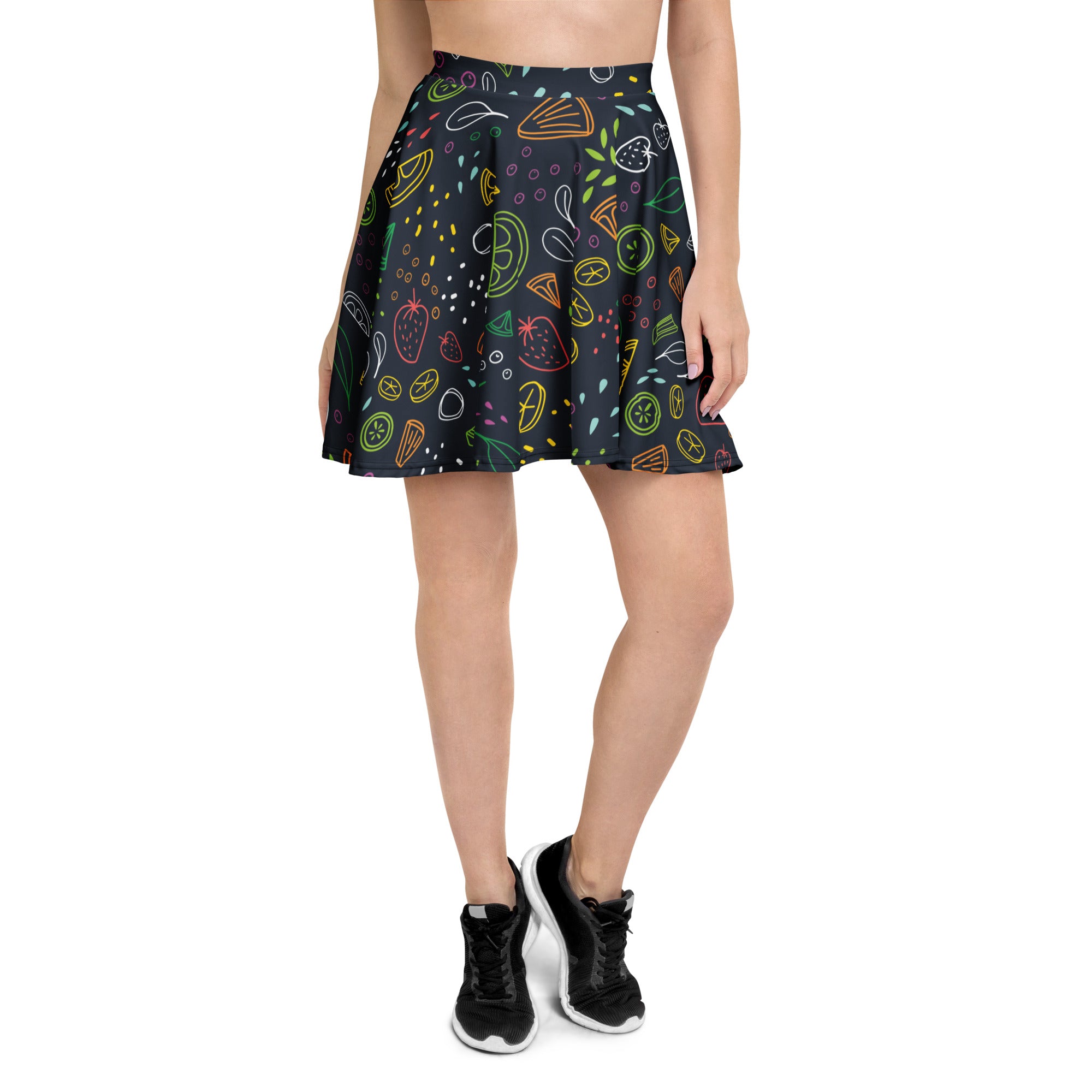 Black pleated women’s neon fruit skater skirt with colorful outlined fruits and vegetables made from recycled fabric