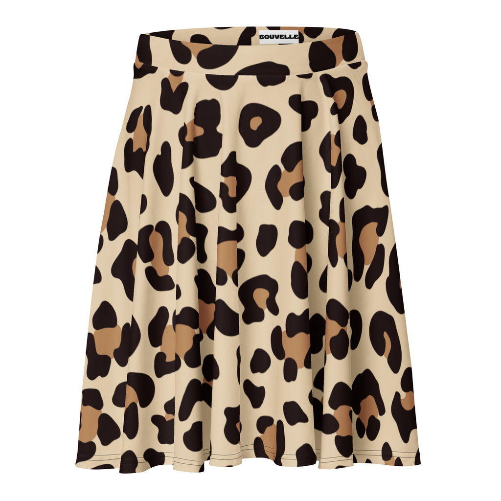 A beige leopard print pleated skater skirt with black and tan spots high waisted with branded bouvelle waistband