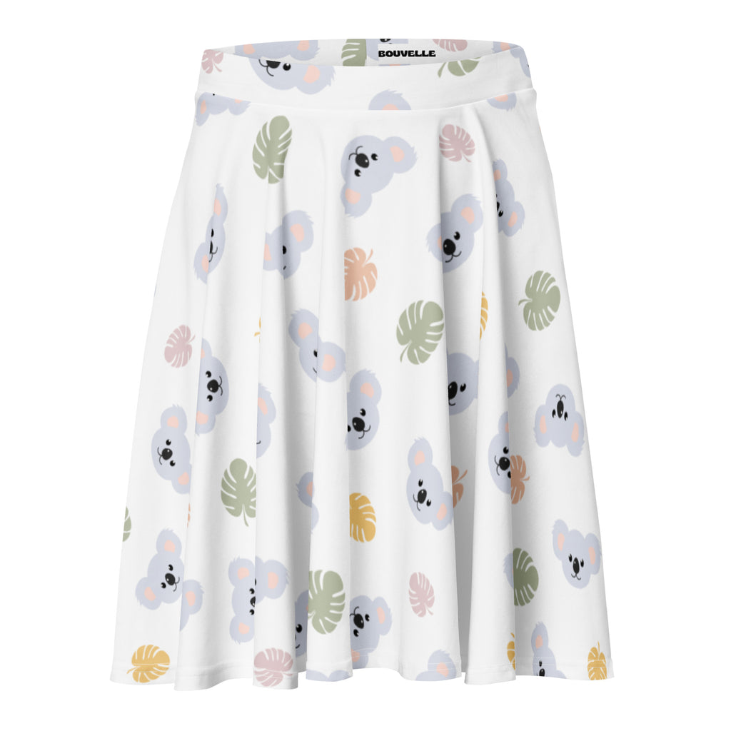 White pleated women’s koala print skater skirt with pastel tropical pattern flowy high waisted recycled fabric upf 50+