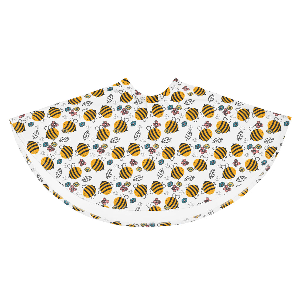 White cape-style garment with yellow bumblebee floral pattern made from recycled fabric with UPF 50 plus protection