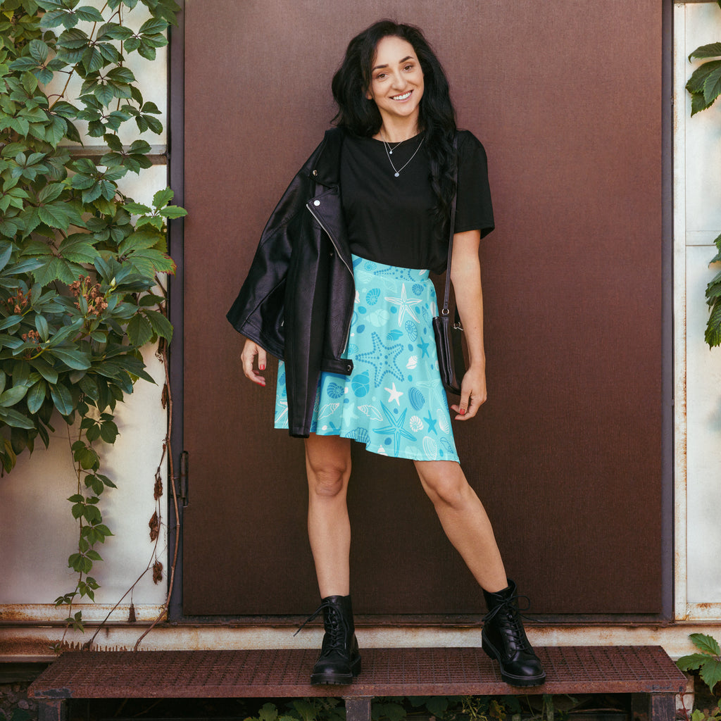 Women’s starfish and shells skater skirt in turquoise with sea-themed print high waisted flowy recycled fabric upf 50+