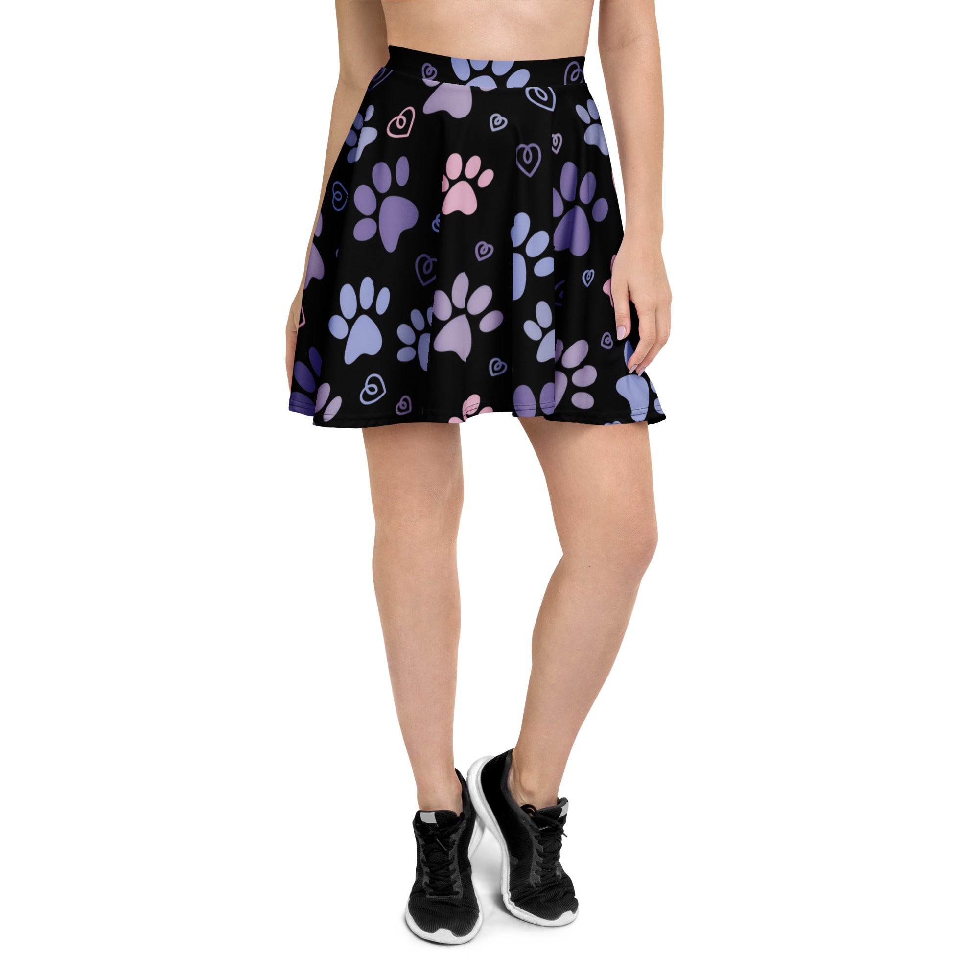 Black flared women’s skater skirt with purple and pink paw prints and hearts made from recycled fabric with UPF 50+ protection