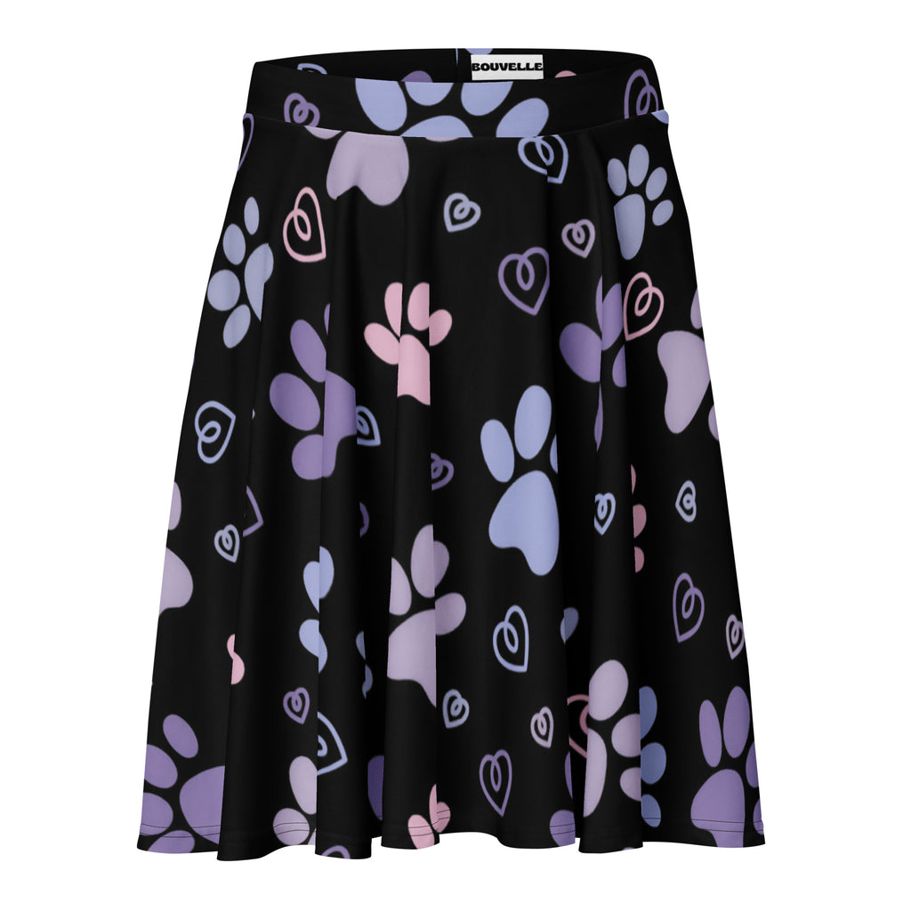 Women’s black pleated skater skirt with pastel purple and pink paw prints and hearts made from recycled fabric with upf 50+