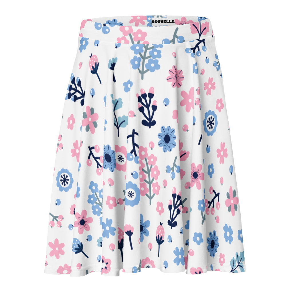 White pleated women’s floral skater skirt with pink and blue flowers navy stems made by bouvelle with upf 50+ and recycled fabric