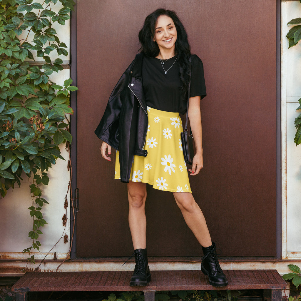 Women’s yellow daisy skater skirt with flowy high waist made from recycled fabric featuring upf 50 plus protection