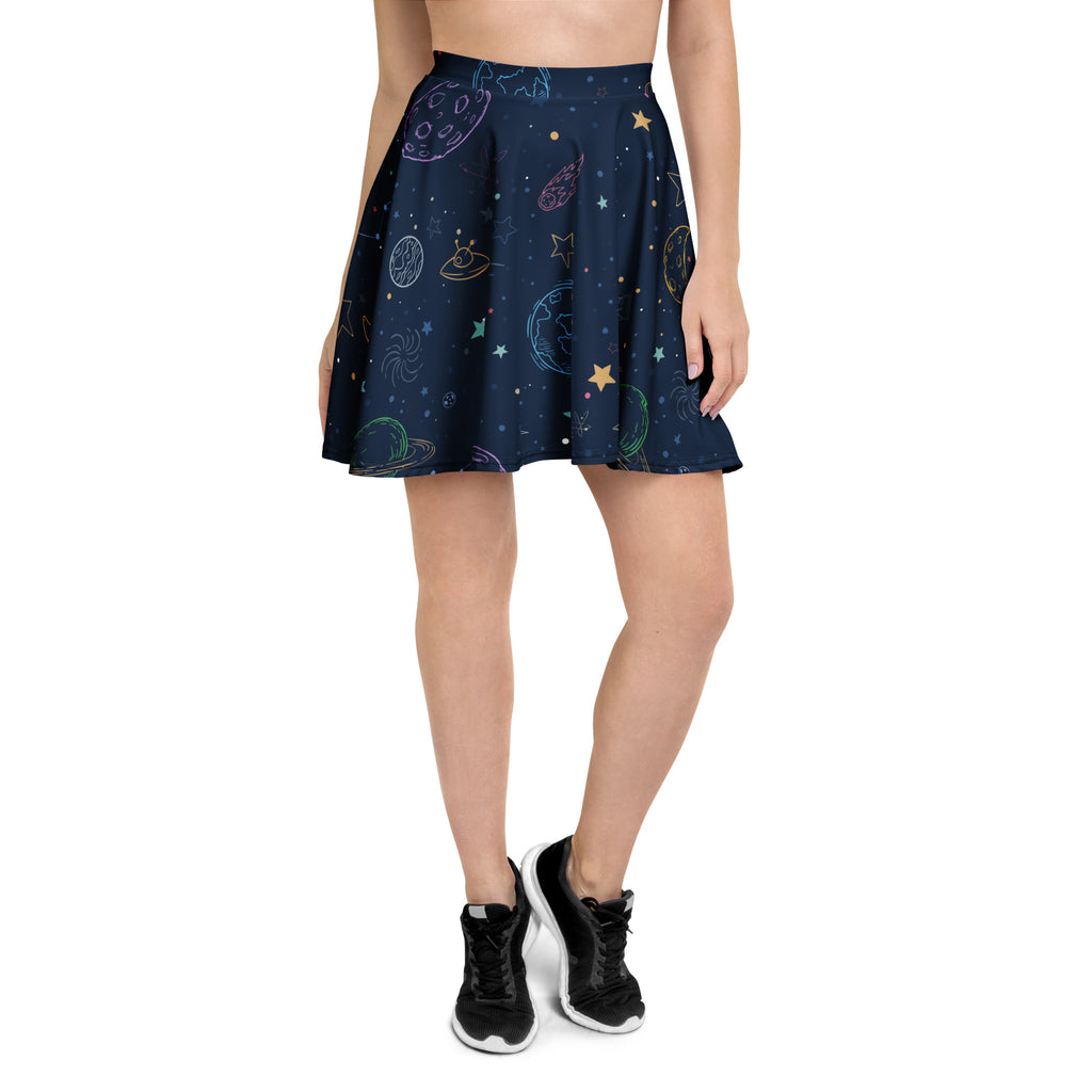 A navy blue flared women’s skater skirt with colorful space-themed print made from recycled fabric with upf 50+ protection