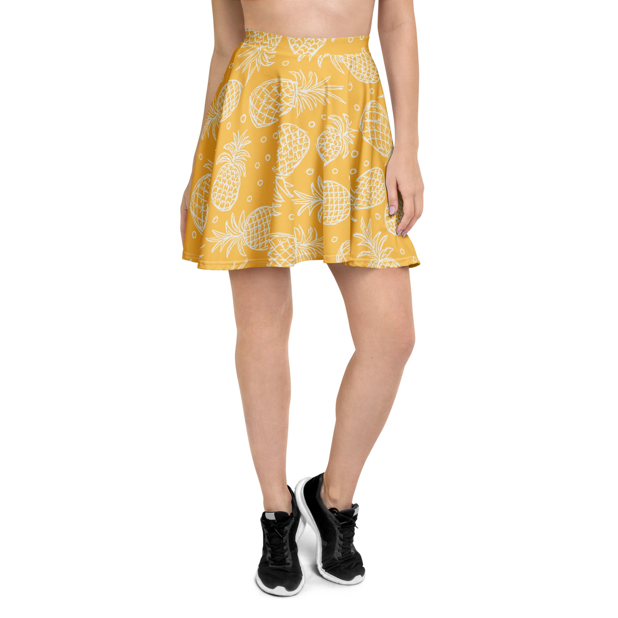 Yellow pleated women’s pineapple skater skirt with white pattern flowy high waisted recycled fabric and UPF 50+ protection