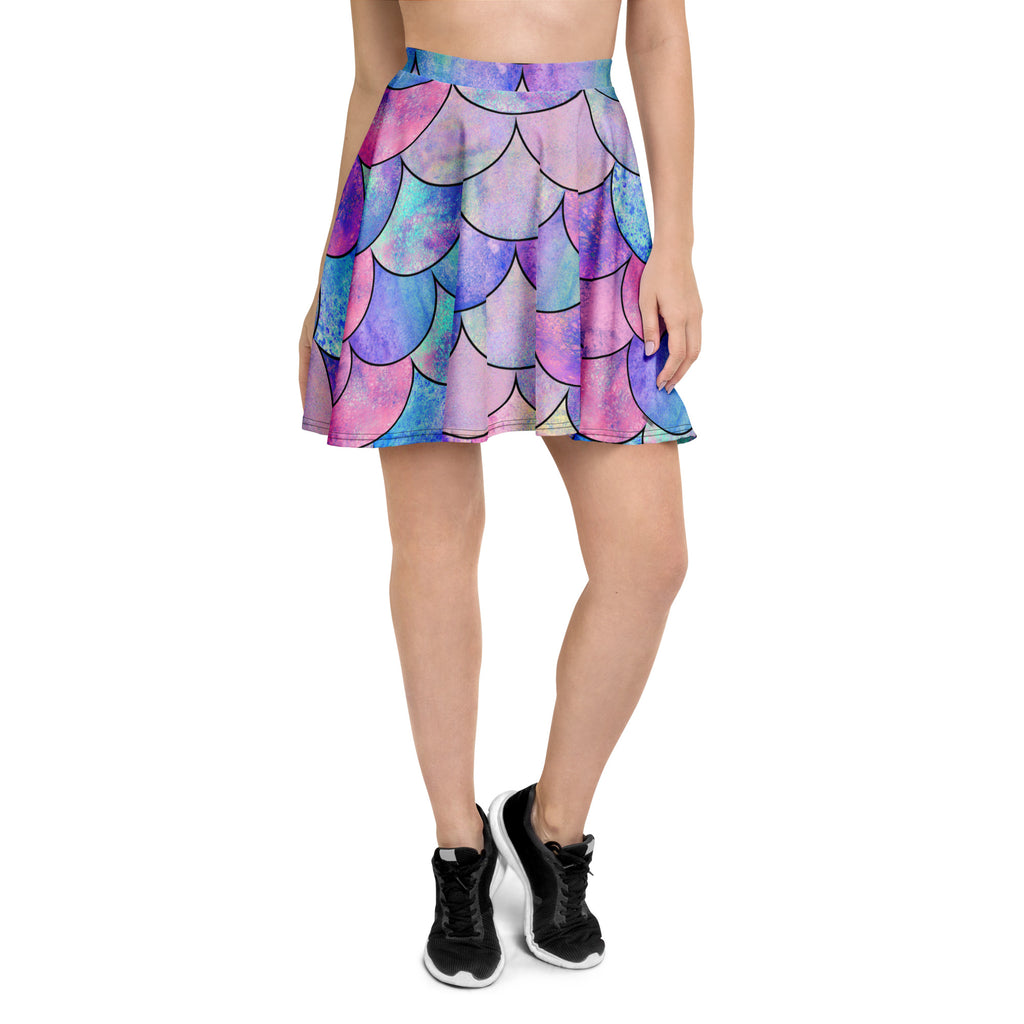 Women’s pastel mermaid skater skirt with vibrant pink purple blue pleated mermaid scale pattern and recycled fabric