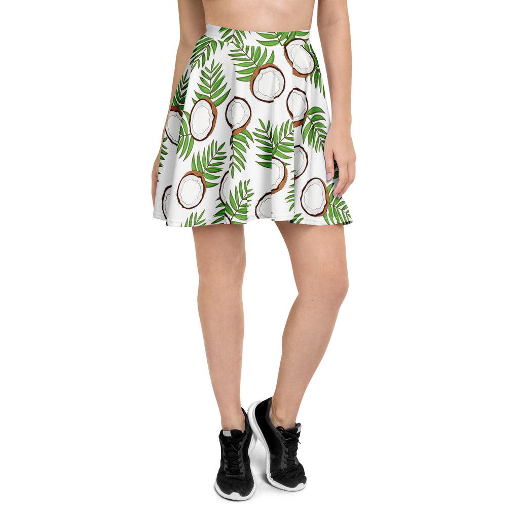 White skater skirt with vibrant green palm leaves and brown coconuts made from recycled fabric with upf 50+ protection