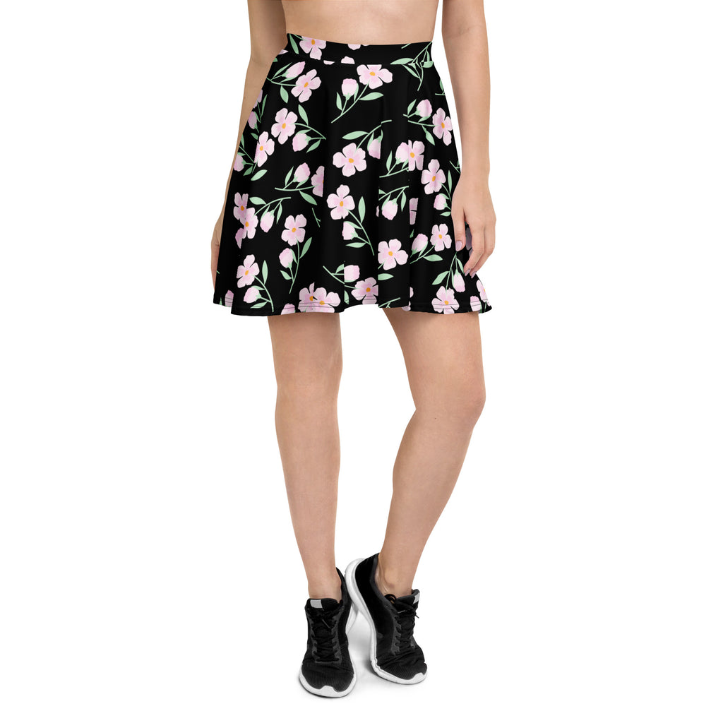 Women’s black floral skater skirt with pink blossoms green stems pleated flowy high waisted recycled fabric upf 50+