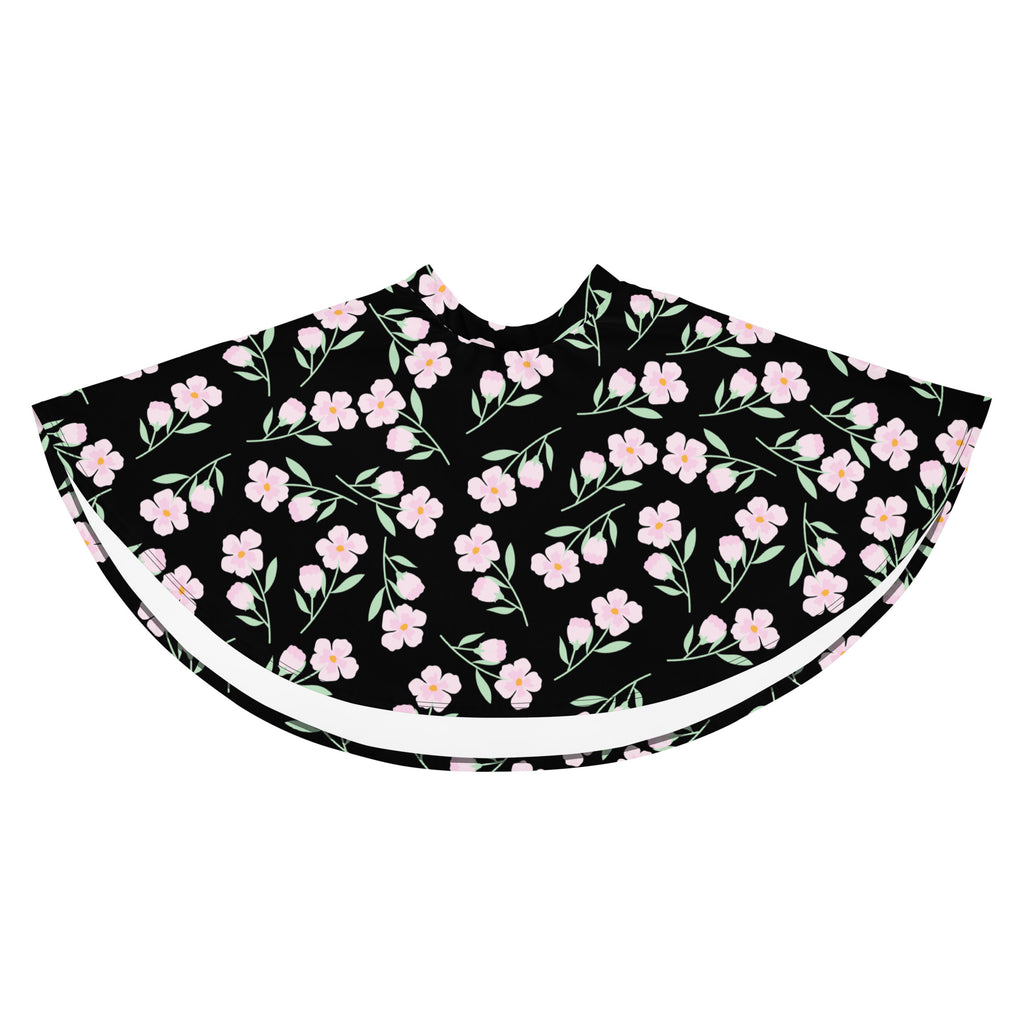 Women’s black floral skater skirt with pink blossoms green stems white trim flowy high waisted UPF 50 plus recycled fabric