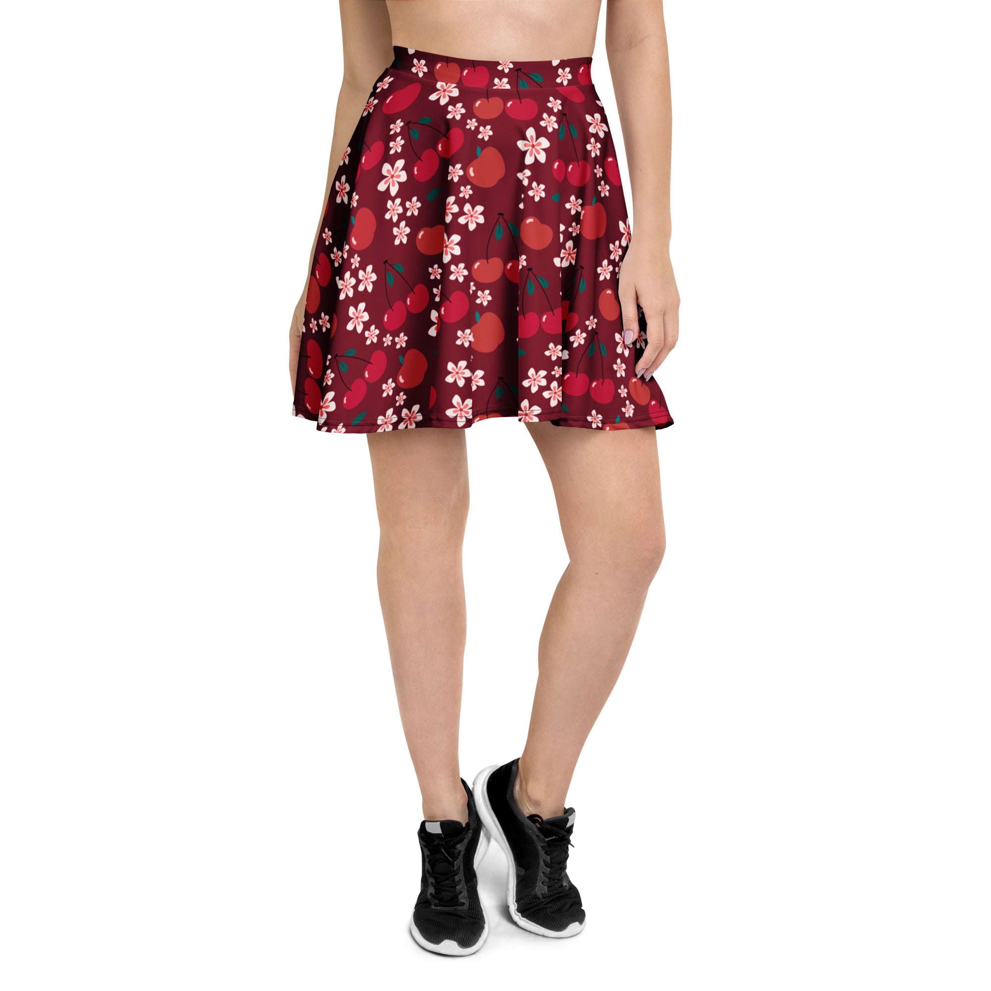 A women’s burgundy cherry blossom skater skirt with a flared fit flowy high waisted made from recycled fabric