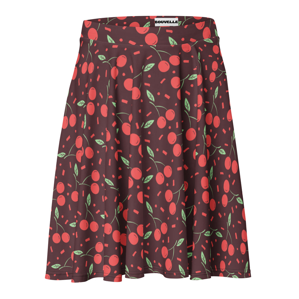 Women’s dark cherry skater skirt with cherry print pleats made from recycled fabric and upf 50 plus protection