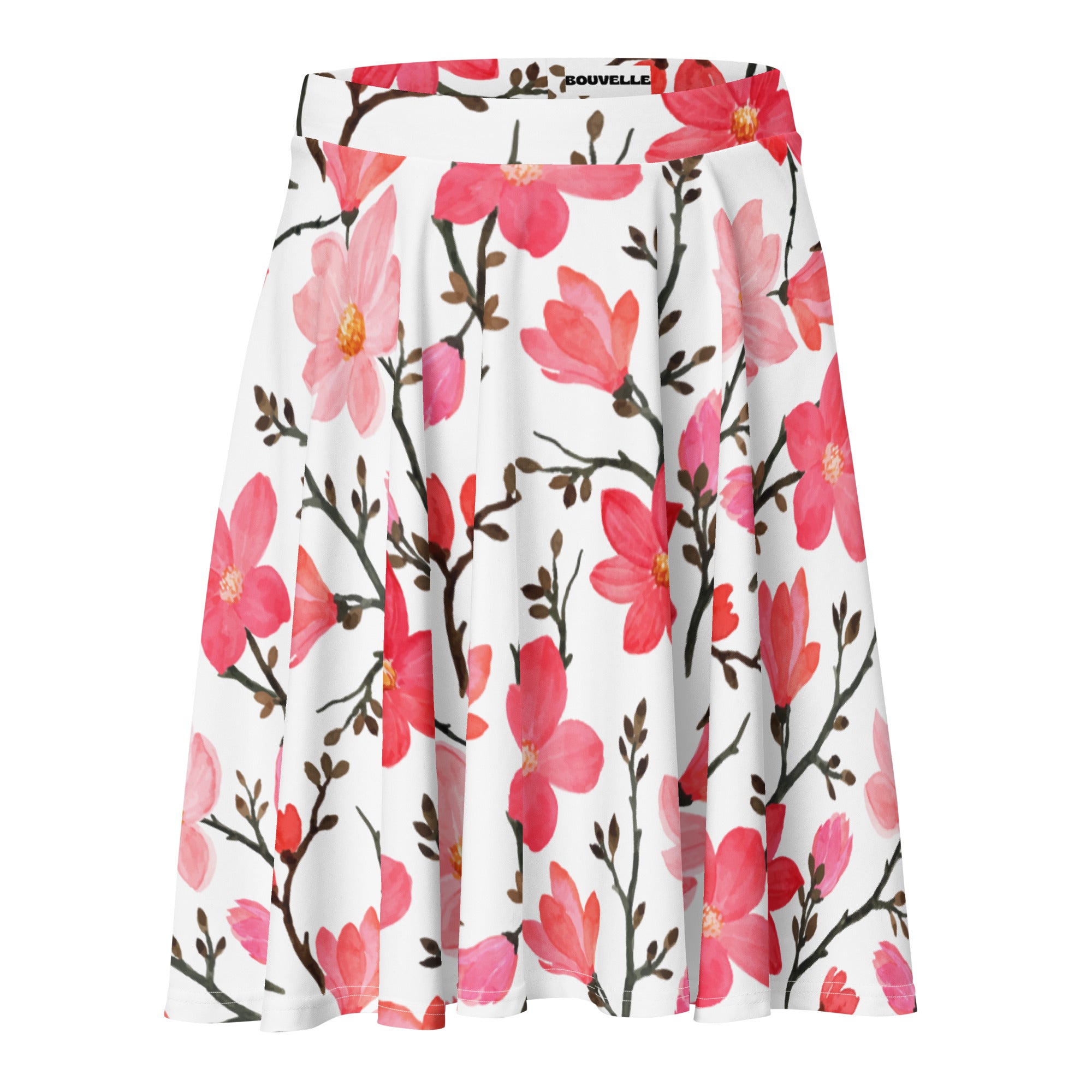A white pleated women’s skater skirt with pink watercolor floral print, high waisted, branded souvelle, made with recycled fabric