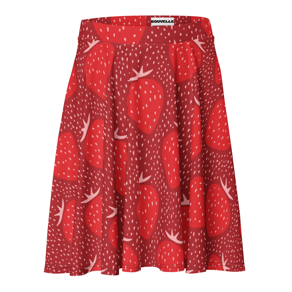 A vibrant red souvelle women’s strawberry floral skater skirt with oversized strawberry print and recycled fabric