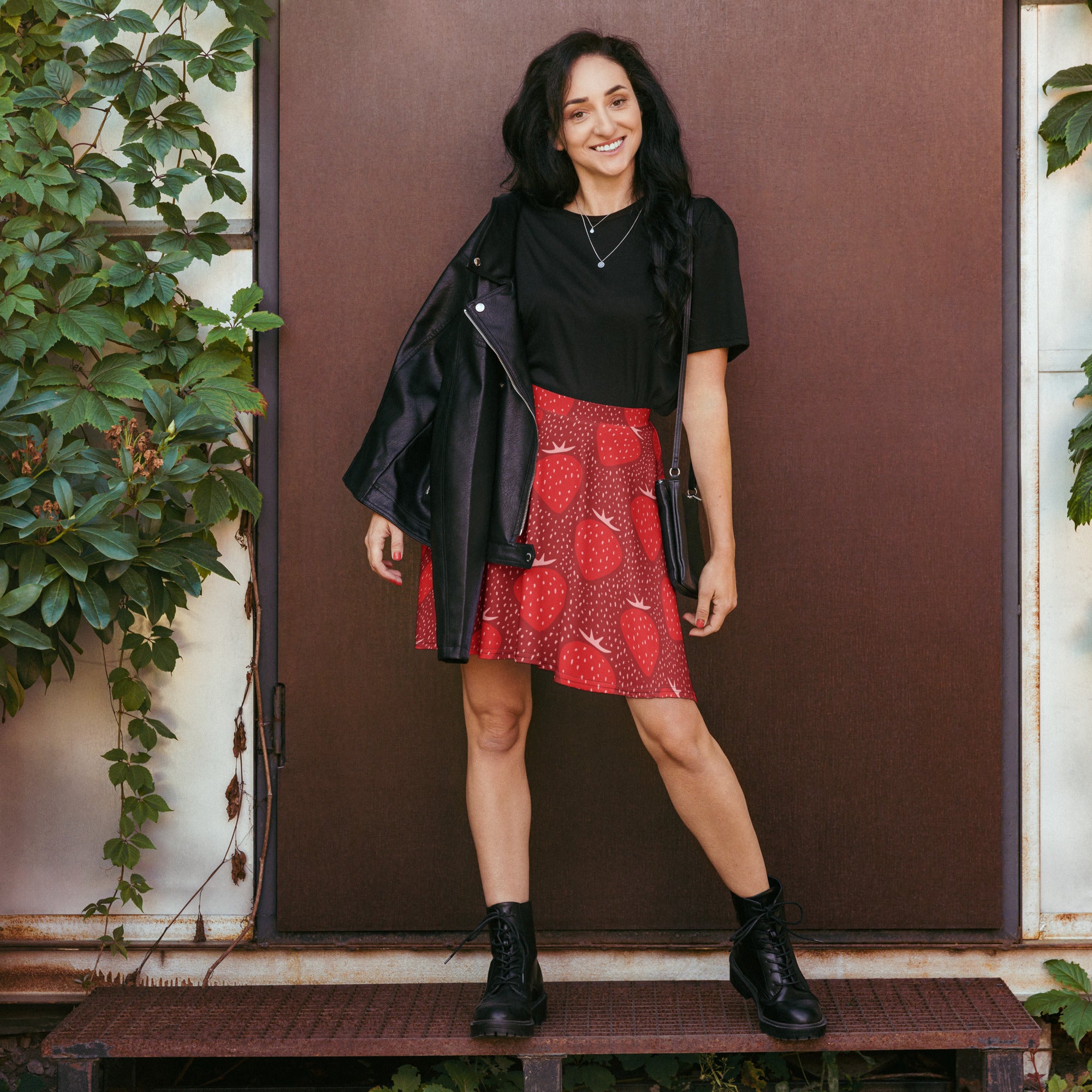 Red strawberry floral skater skirt with flowy high waisted design made from recycled fabric with upf 50 plus protection