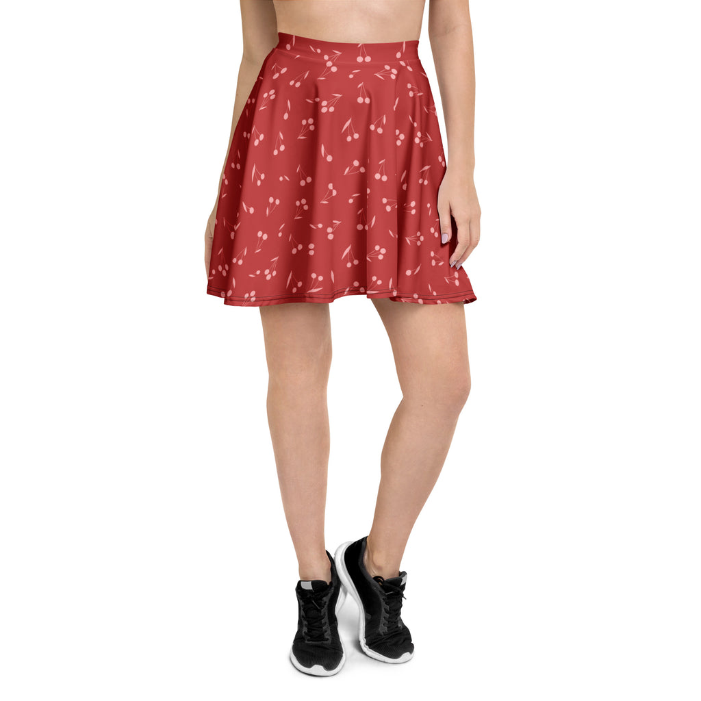 A red cherry-print womens minimal skater skirt with high waist soft flowy fabric upf 50 plus recycled fabric