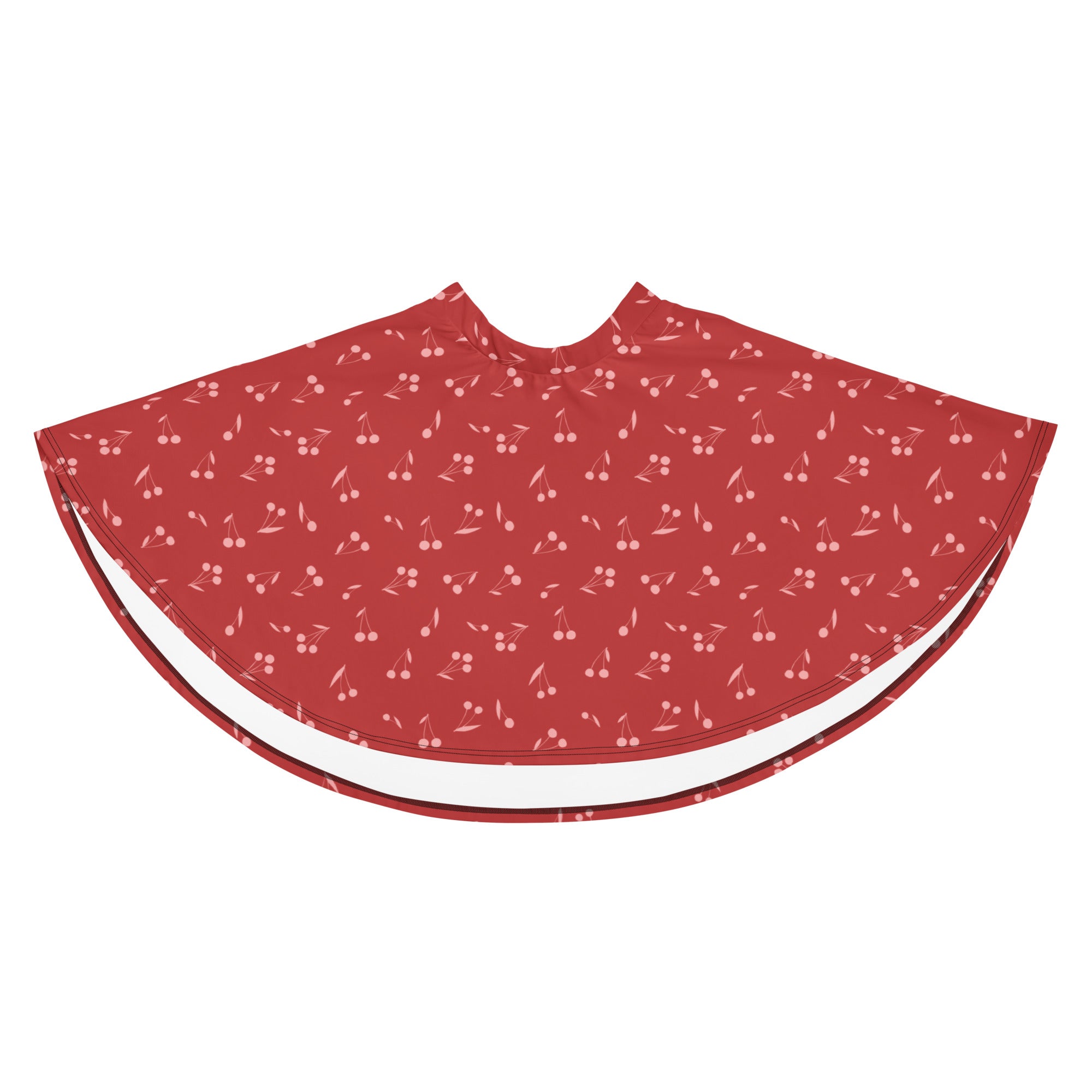 Red cherry patterned cape with white trim made from recycled fabric offering UPF 50 plus sun protection