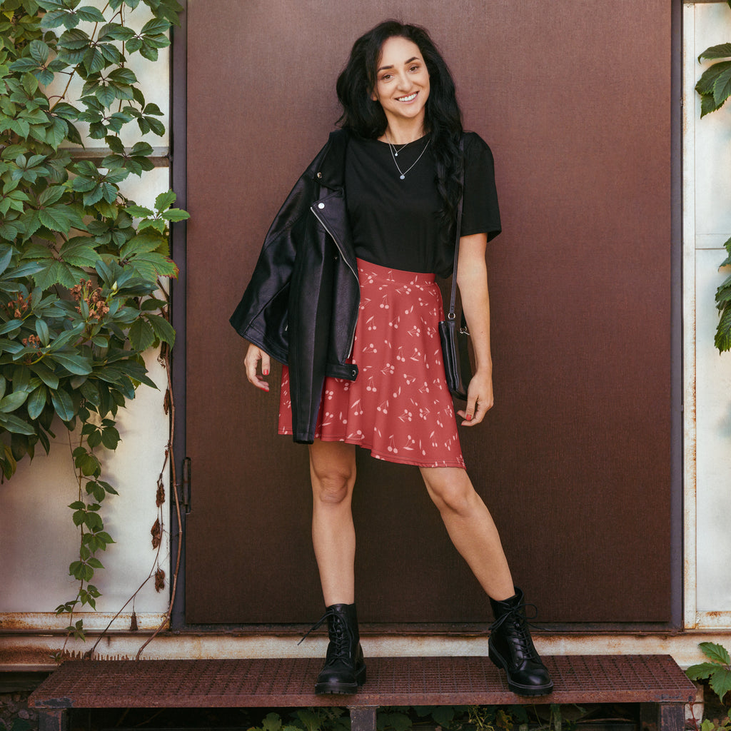 Women’s minimal cherry skater skirt in red with subtle white floral pattern made of lightweight recycled fabric with upf 50+