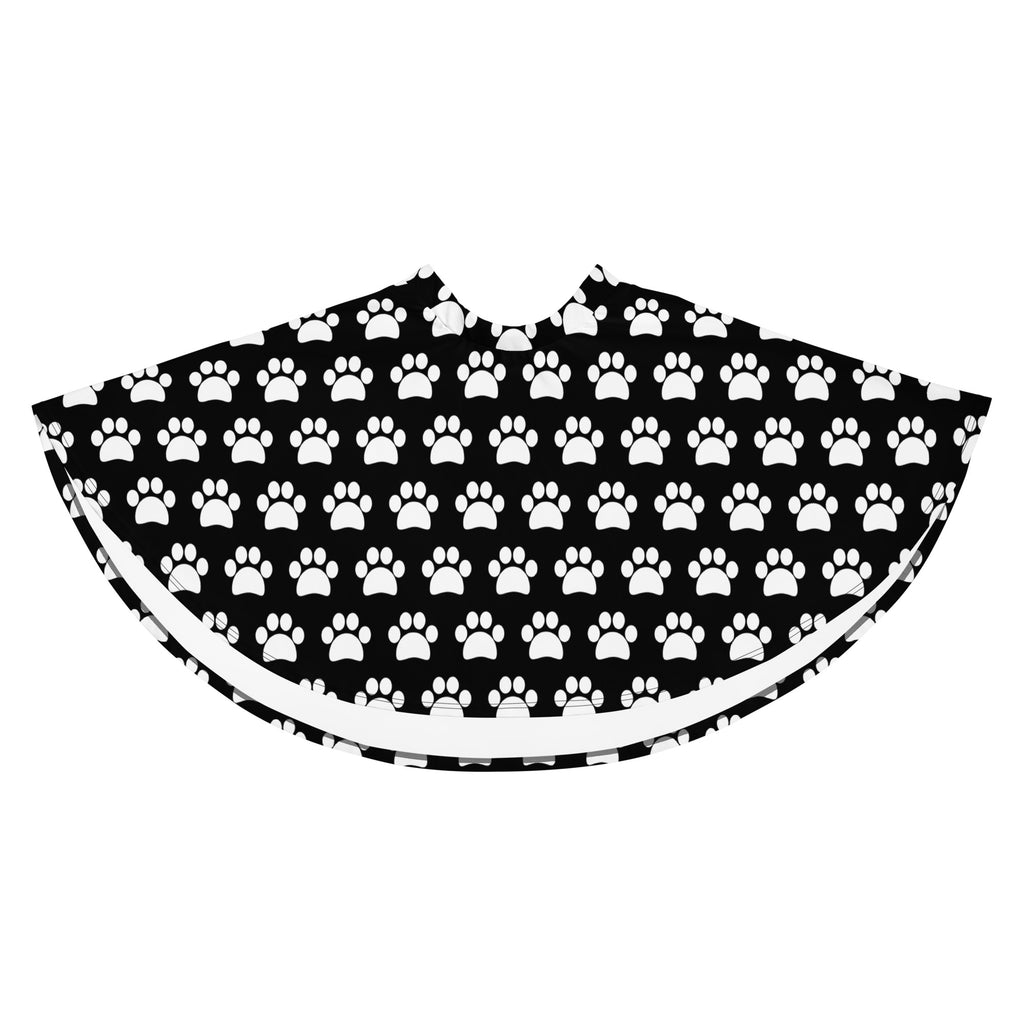 Black and white paw print patterned christmas tree skirt made from recycled fabric and flowy high waisted design