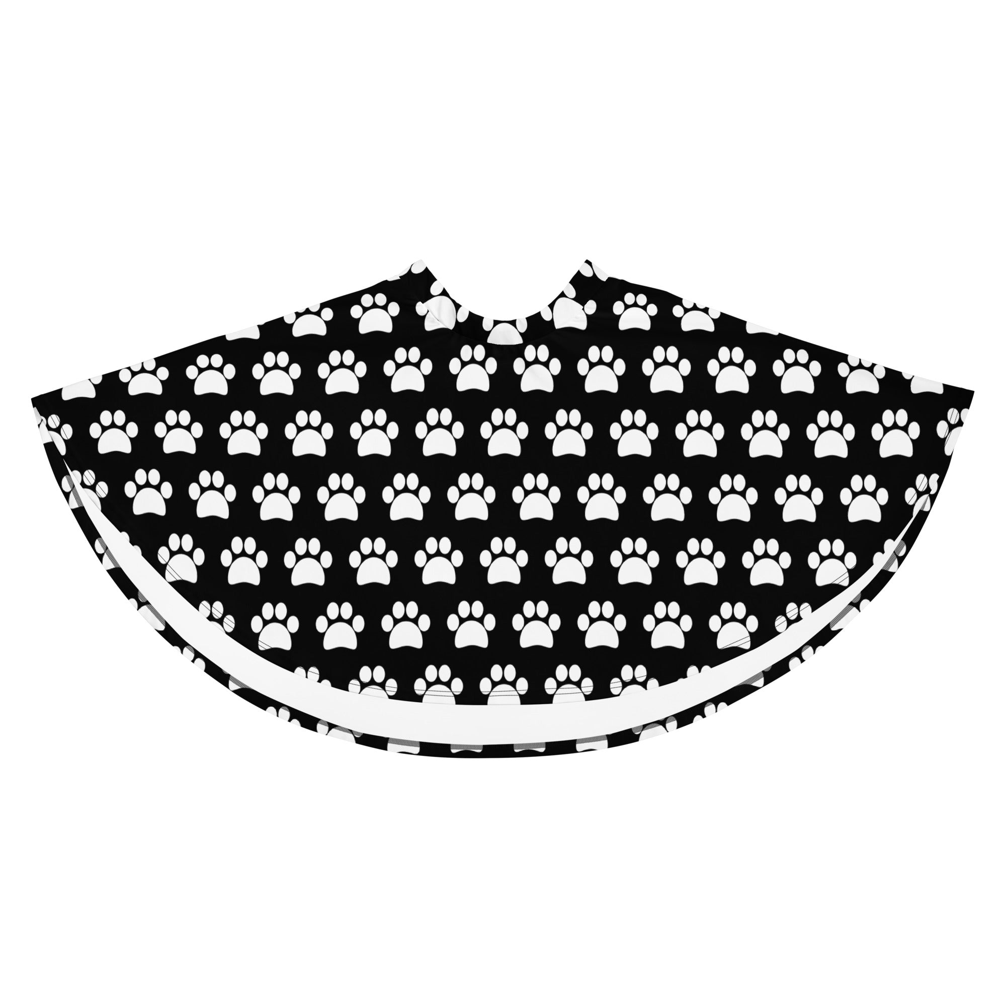 Black and white paw print patterned christmas tree skirt made from recycled fabric and flowy high waisted design