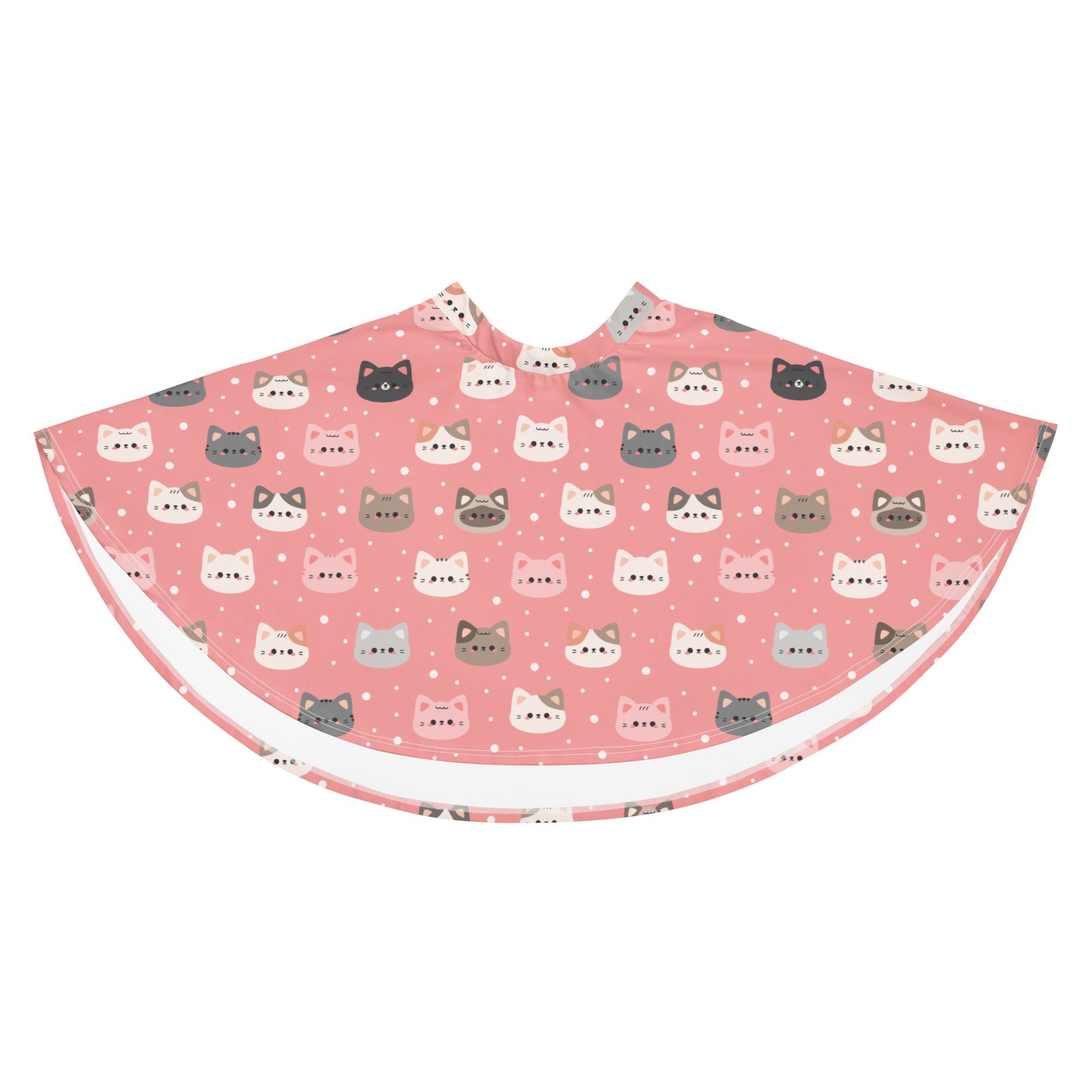 Pink cat themed cape with white lining featuring colorful cartoon cats in a flowy high waisted recycled fabric design