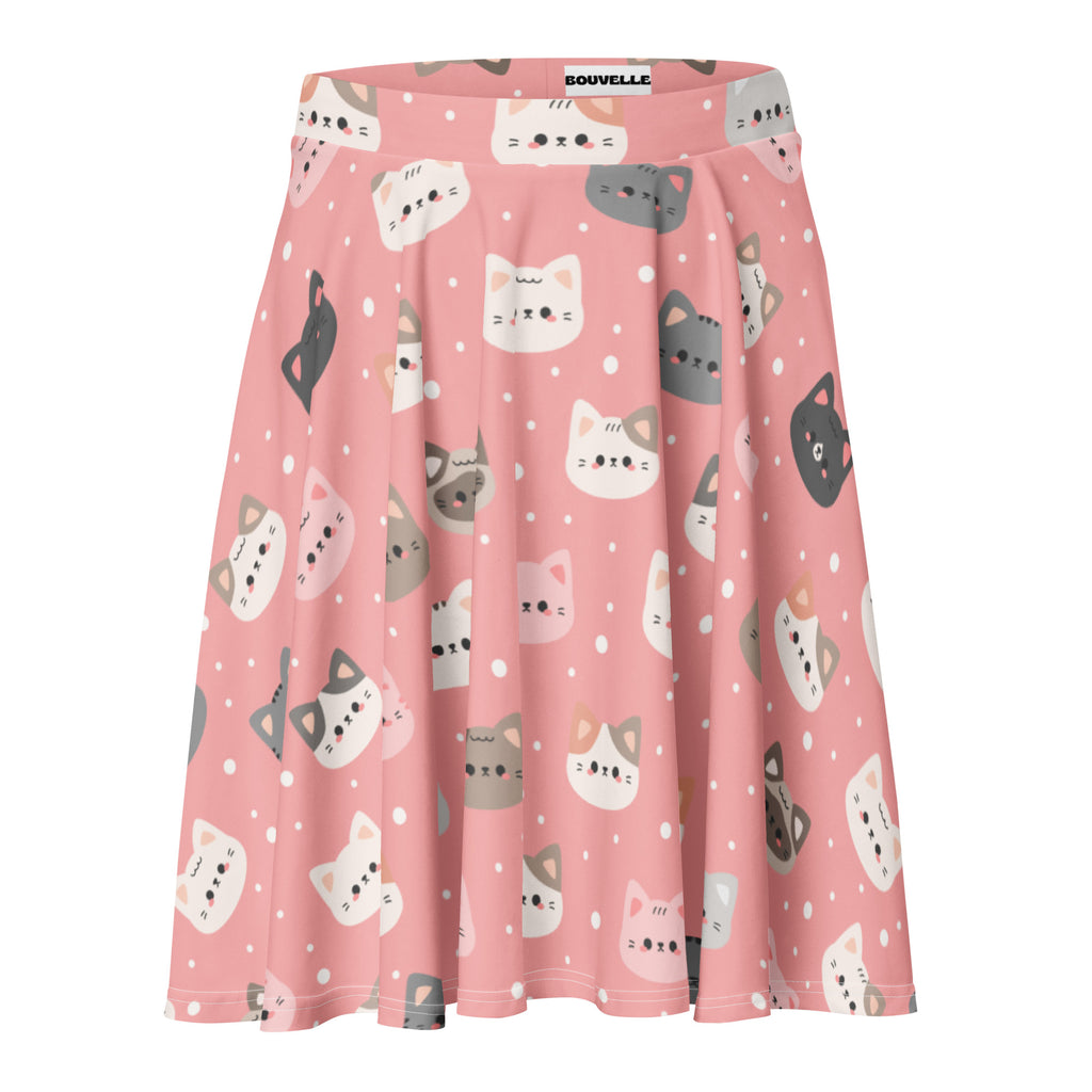 Women’s cute pink skater skirt with pleats featuring white gray and black cartoon cat faces and small polka dots