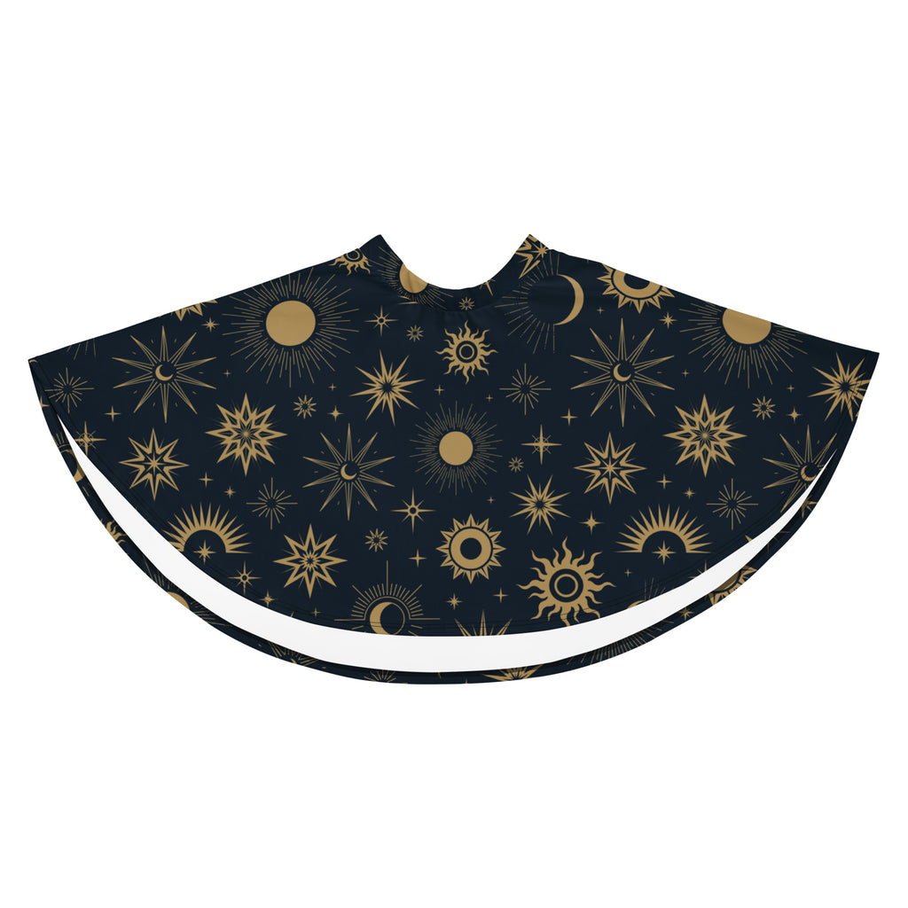 A navy blue barber cape with intricate gold celestial sun moon and star patterns matching womens celestial sun and moon skater skirt