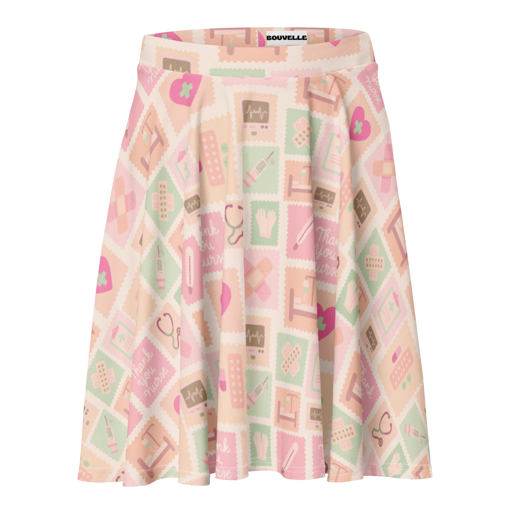 Women’s pink nurse icon skater skirt with pleats featuring a playful medical pattern in mint and pink with UPF 50+ recycled fabric