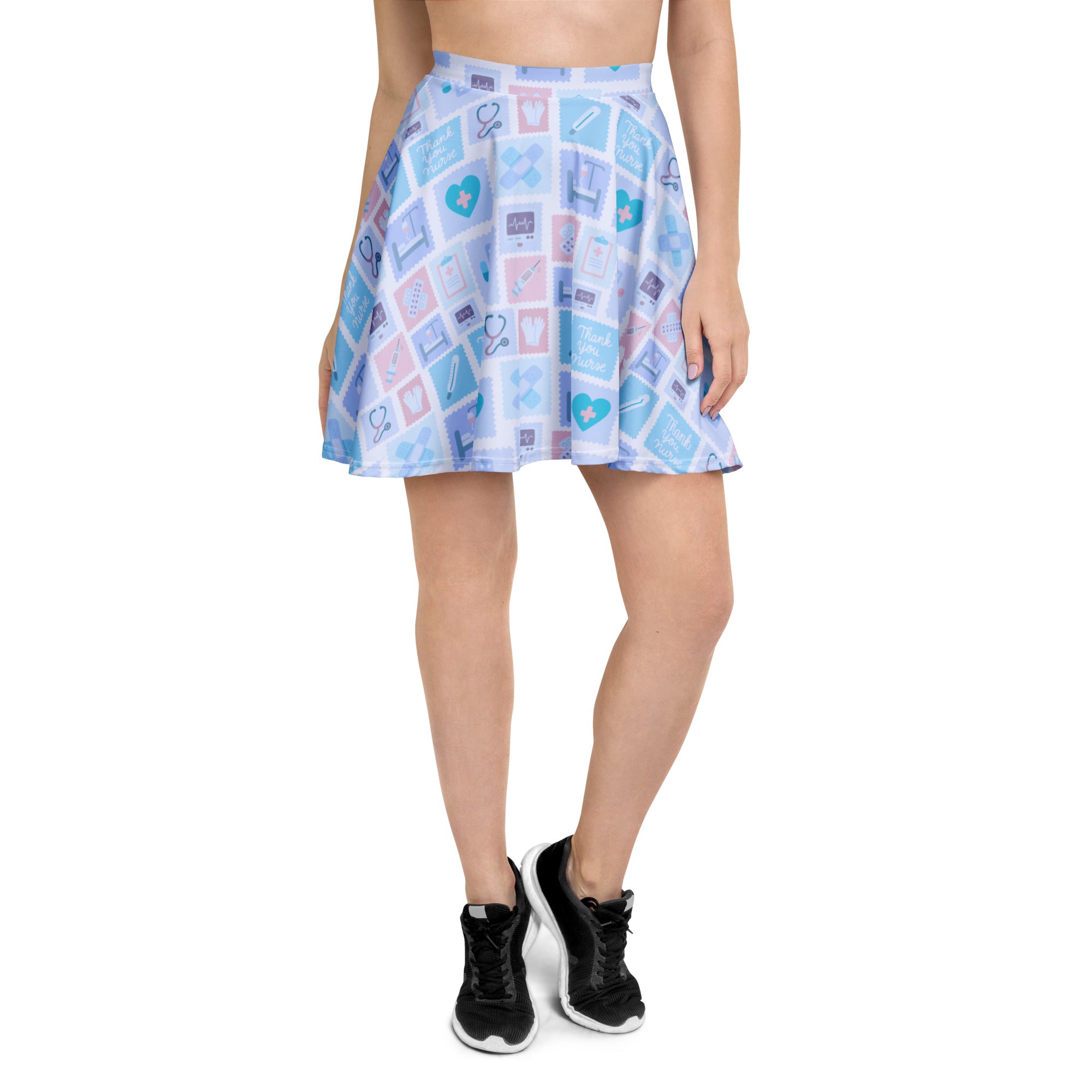 Women’s blue nurse icon skater skirt with light blue and pink medical patterns made from recycled fabric with UPF 50+