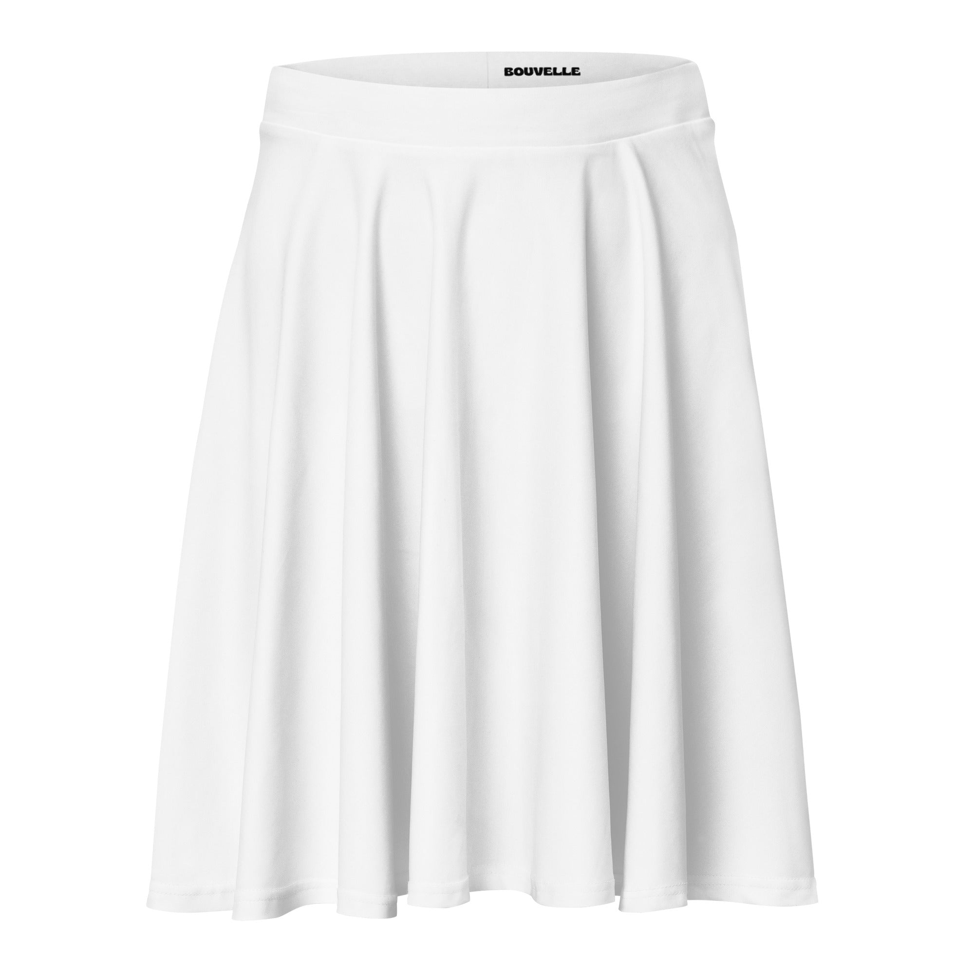 White pleated women’s skater skirt with soft flowing recycled fabric and bouvelle brand label at the waistband