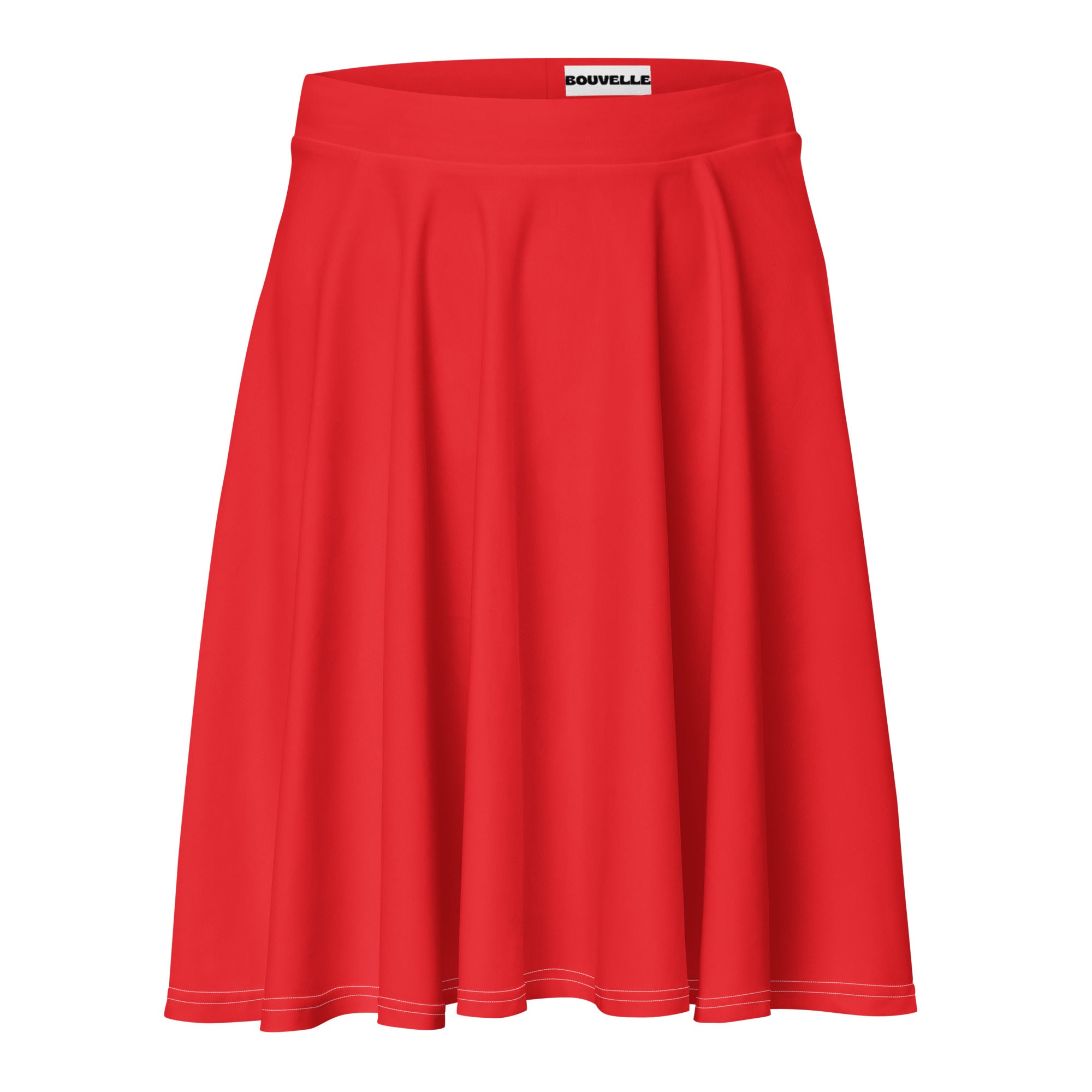A vibrant red pleated a-line skirt with soft elastic waistband and stitched hem made from recycled fabric
