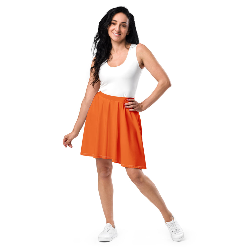 Women’s orange a-line skater skirt with fitted waistband soft flowing recycled fabric and upf 50+ protection