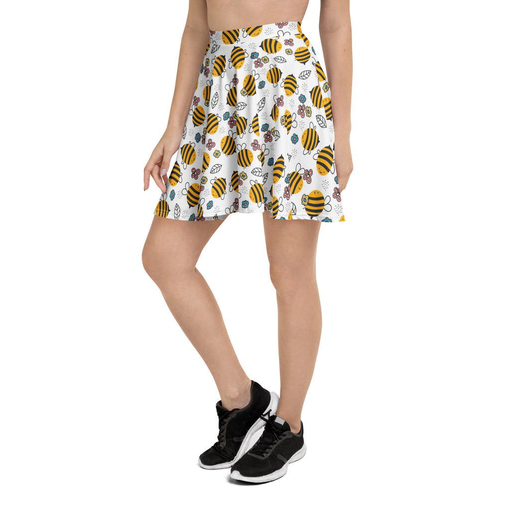 White floral yellow bumblebee skater skirt with playful bee and flower pattern made from recycled fabric with UPF 50+