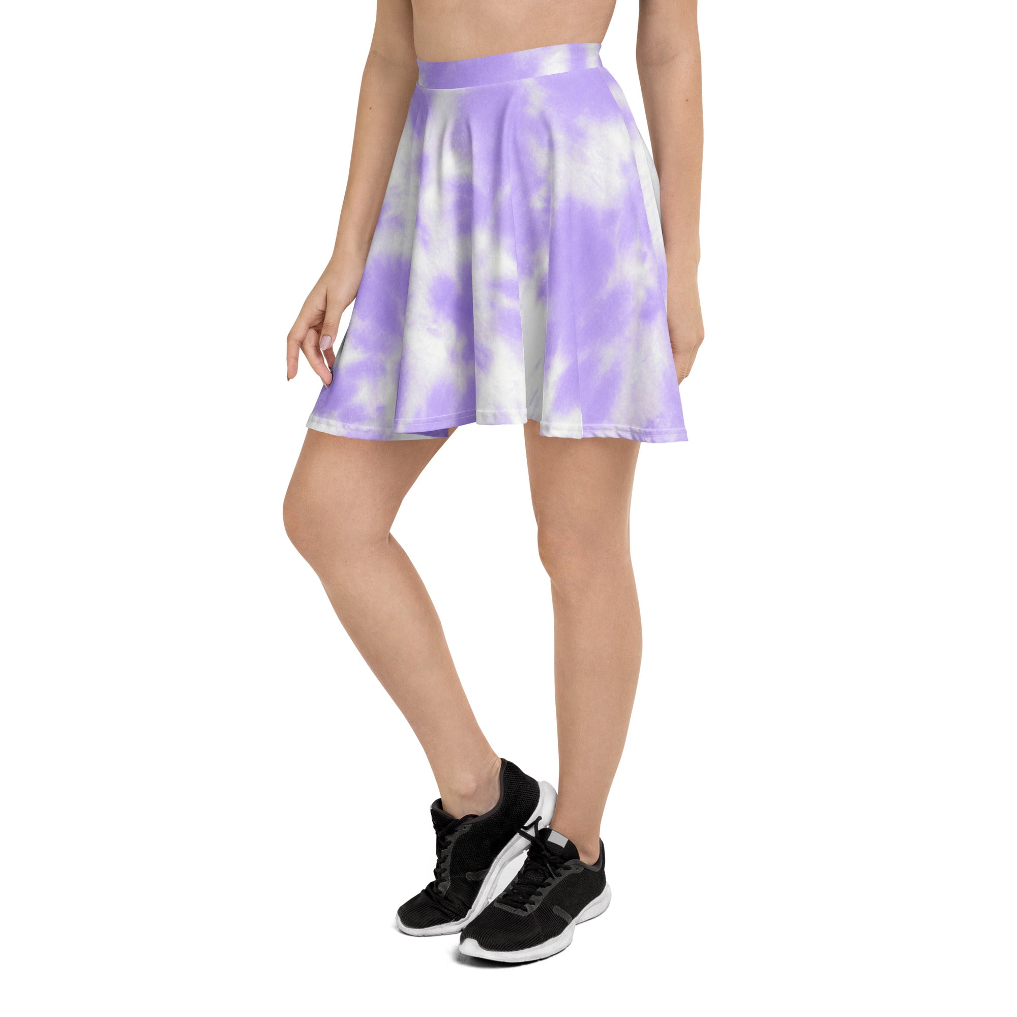 A lightweight women’s purple tie dye skater skirt with a flared high waisted design made from recycled fabric